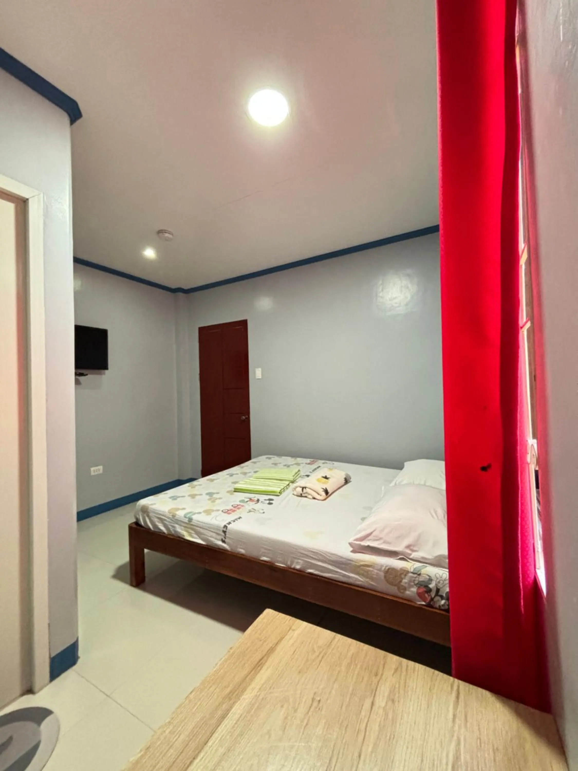 Bed in La Fela Pension House