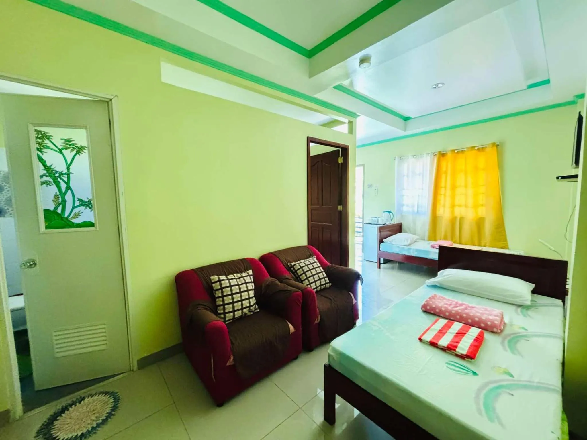 Bed in La Fela Pension House