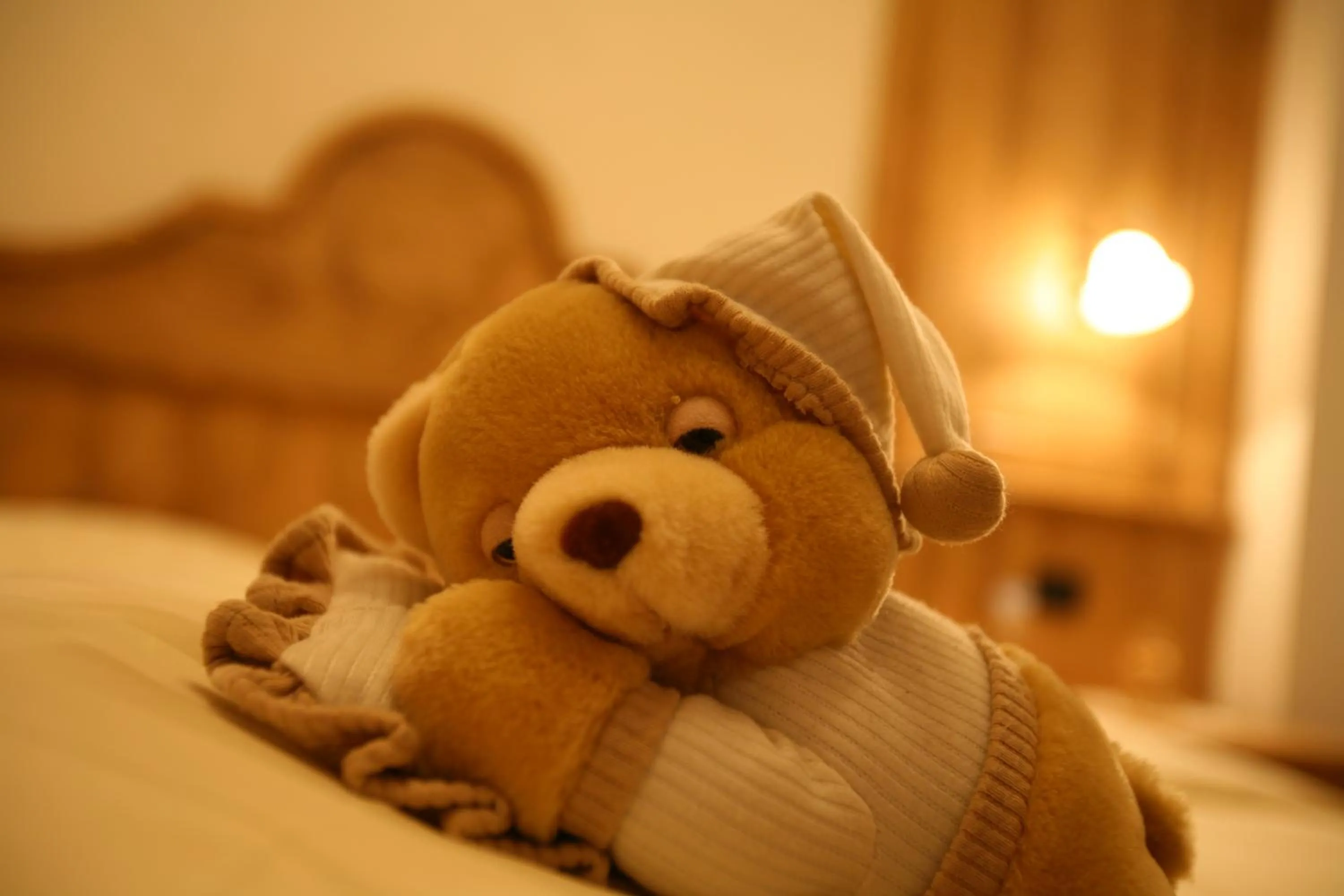 Decorative detail, Bed in Garnì Prà Fiorì