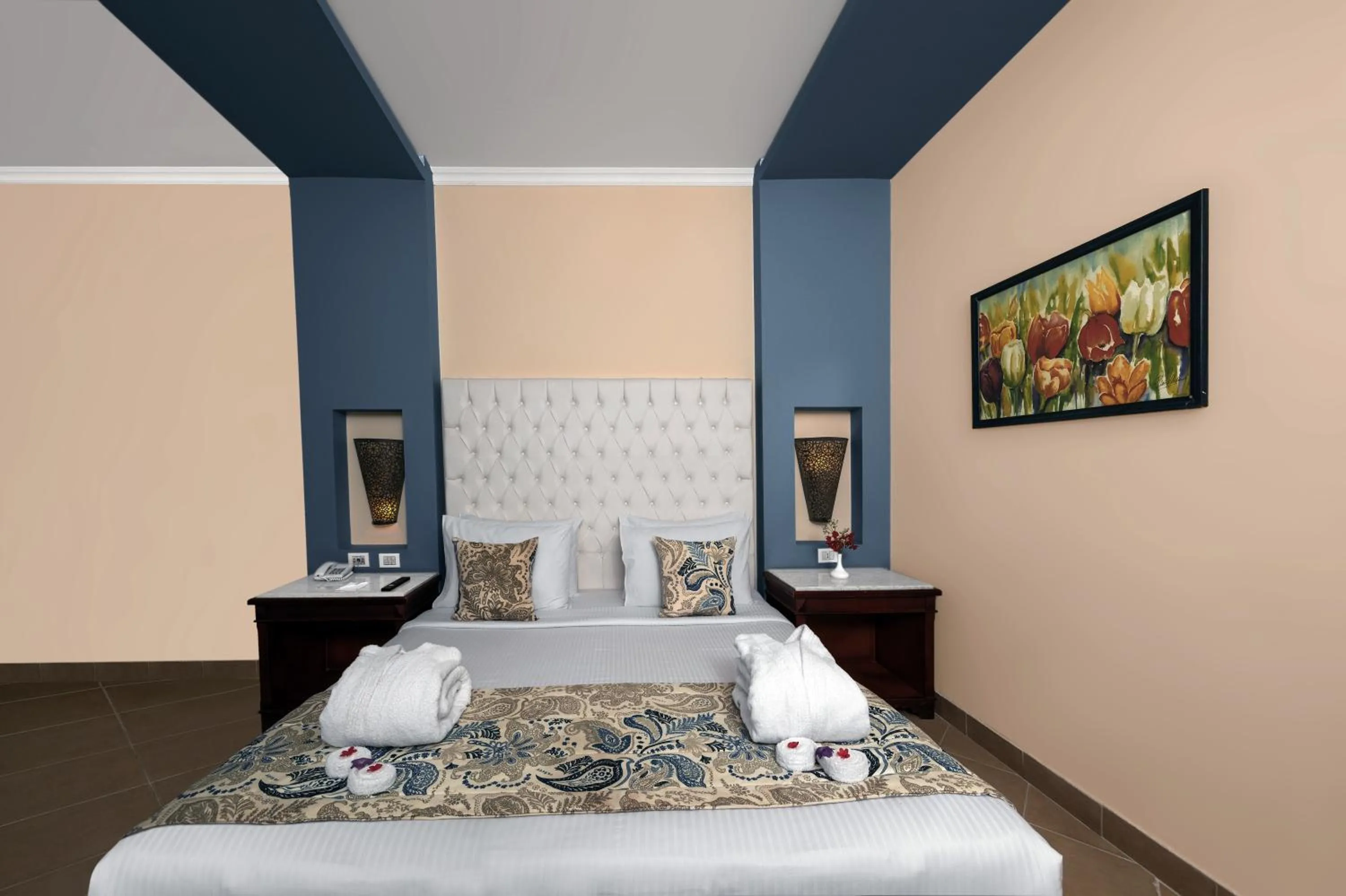 Bed in Amwaj Oyoun Resort