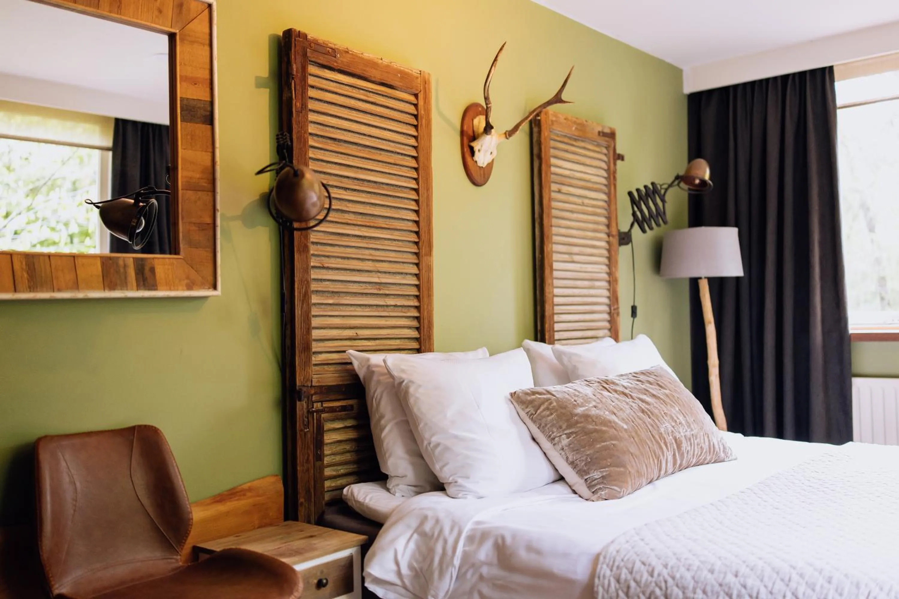 Bed in Hotel & Restaurant Meneer Van Eijck