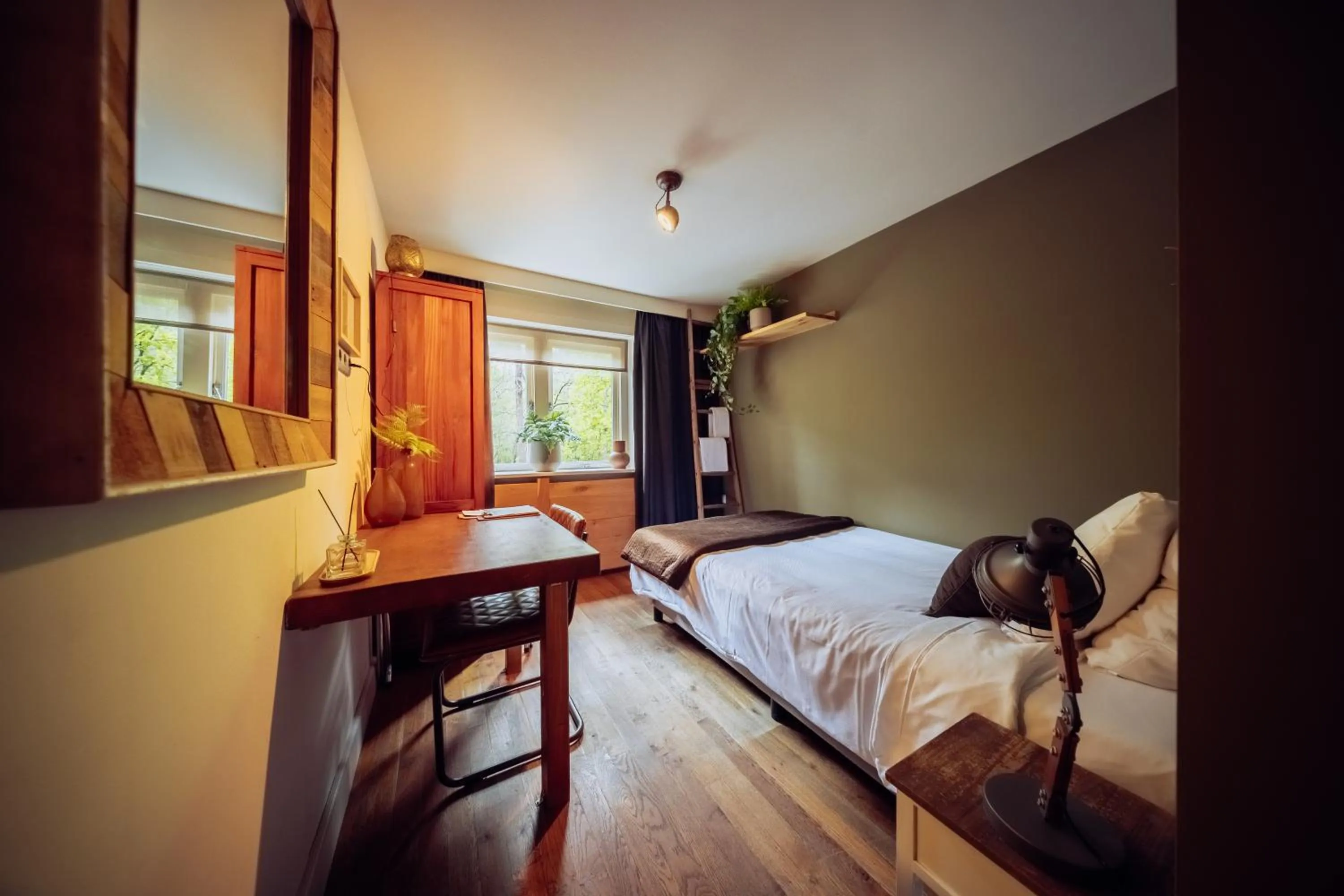 Bed in Hotel & Restaurant Meneer Van Eijck