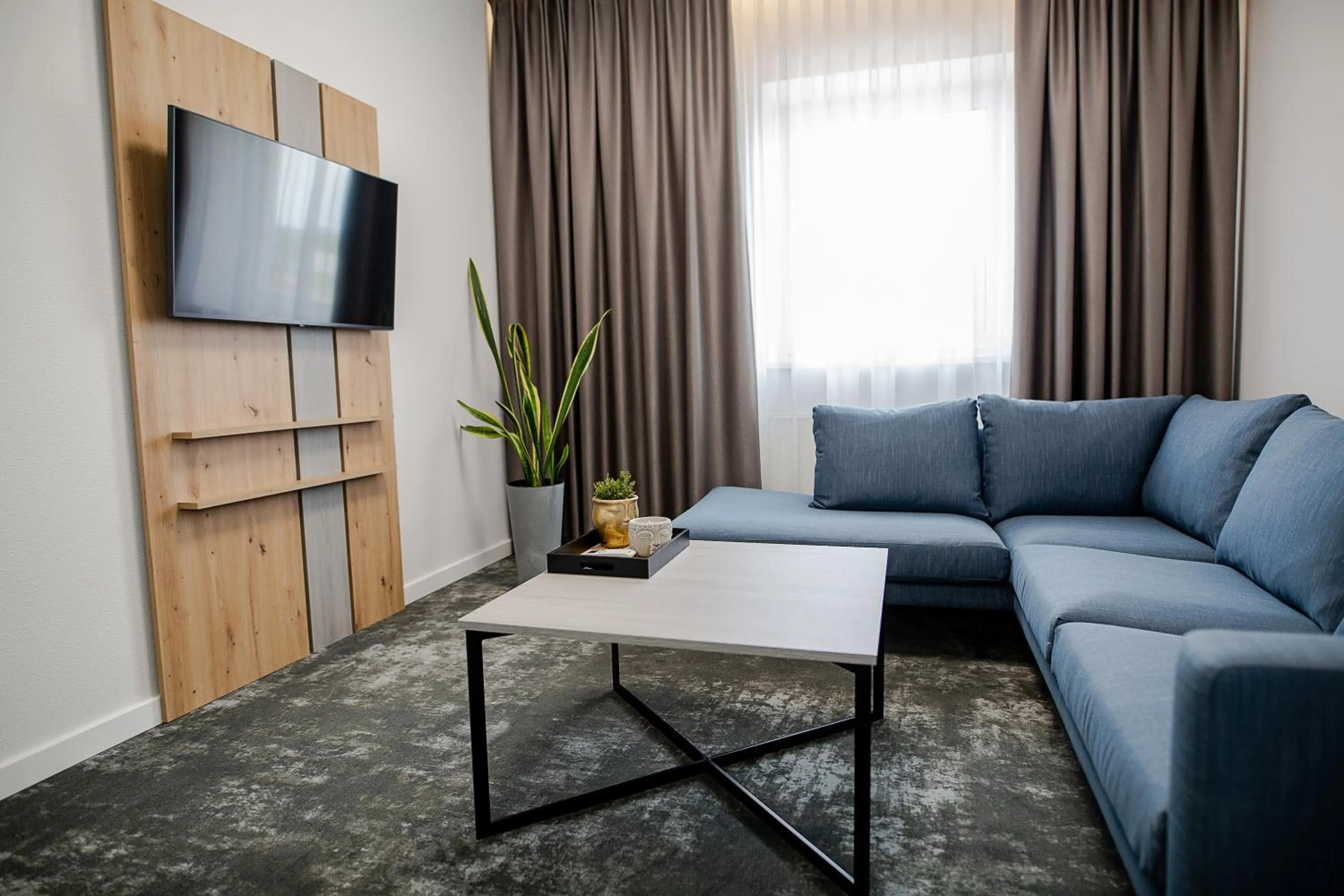 Communal lounge/ TV room in Hotel Tomas