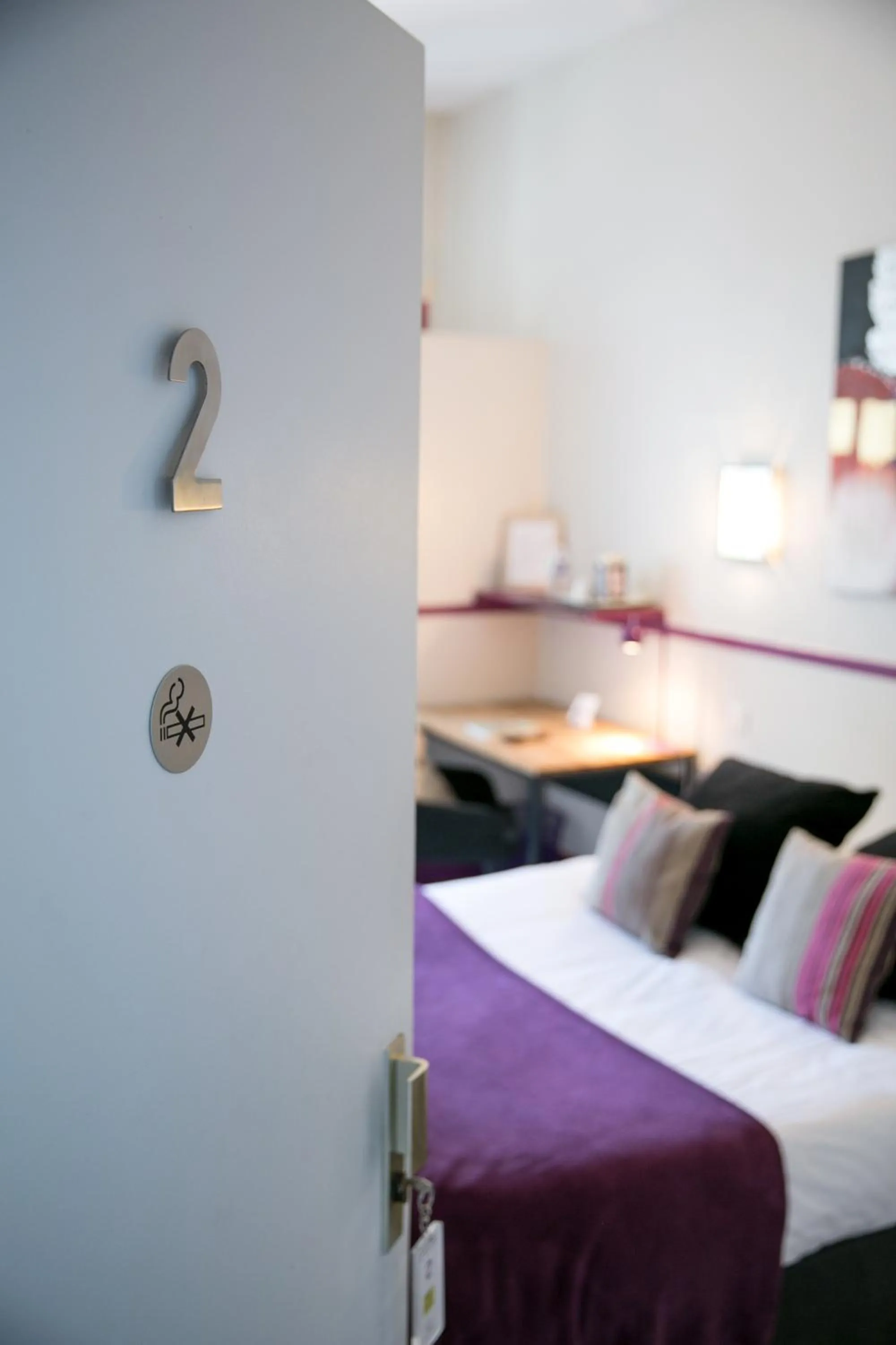 Bed in Logis Auberge De L'ombrée