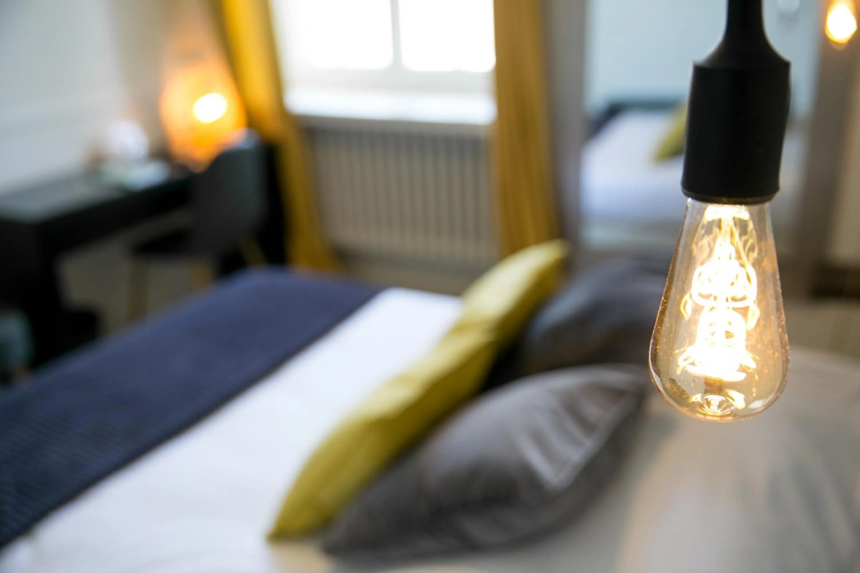 Bed in Logis Auberge De L'ombrée