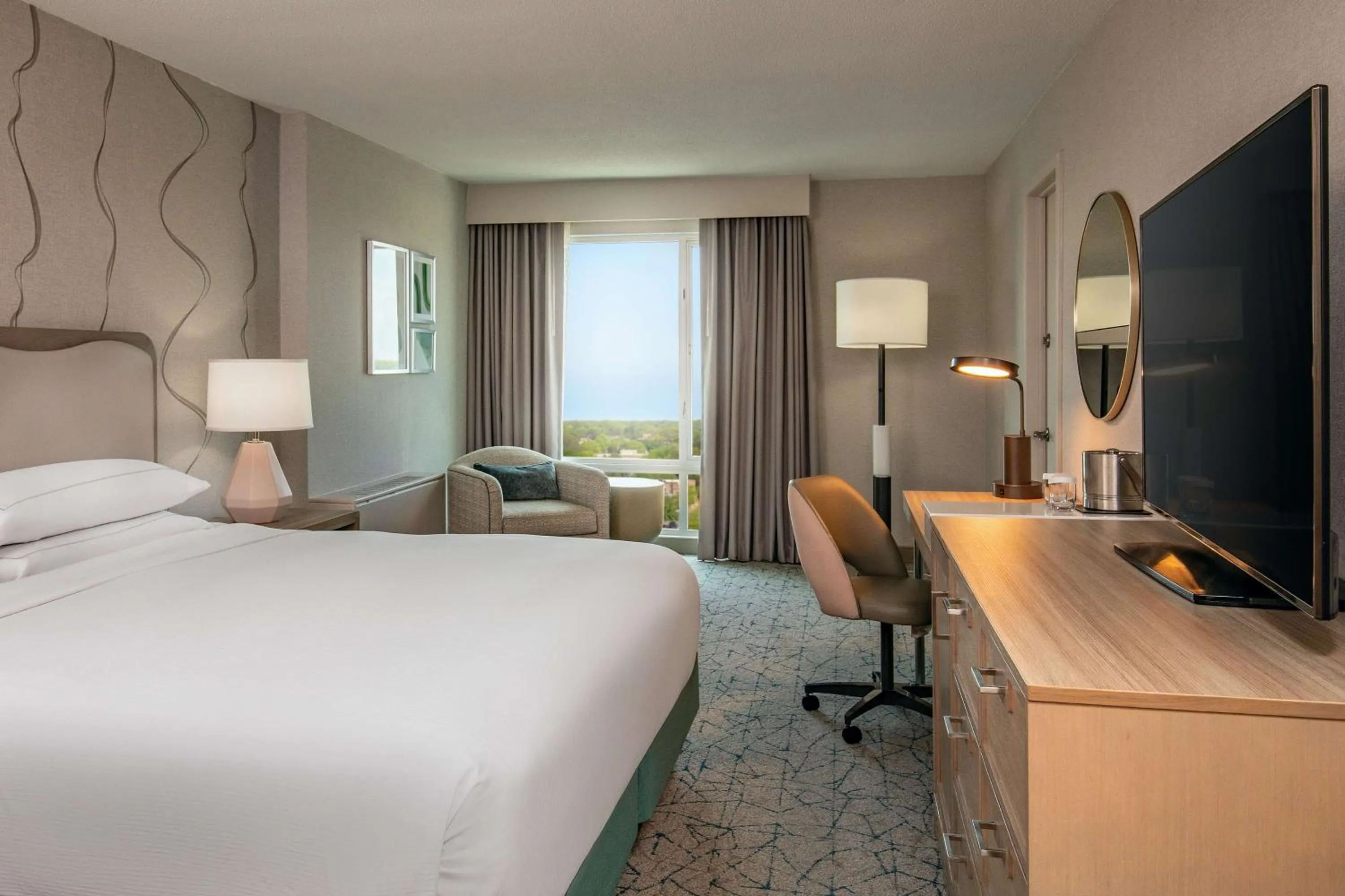 Bed in DoubleTree by Hilton Hotel and Conference Center Chicago North Shore