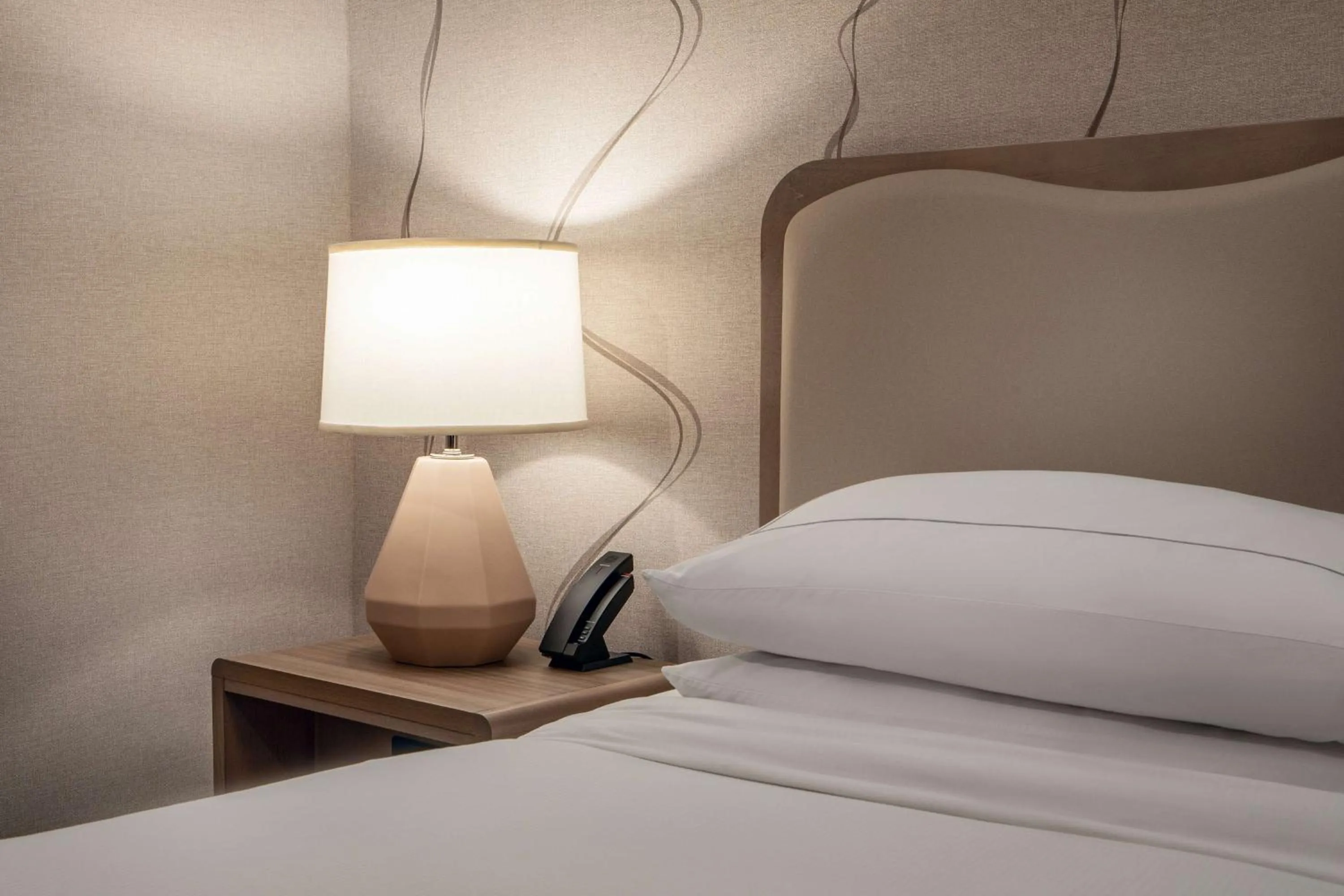 Bed in DoubleTree by Hilton Hotel and Conference Center Chicago North Shore