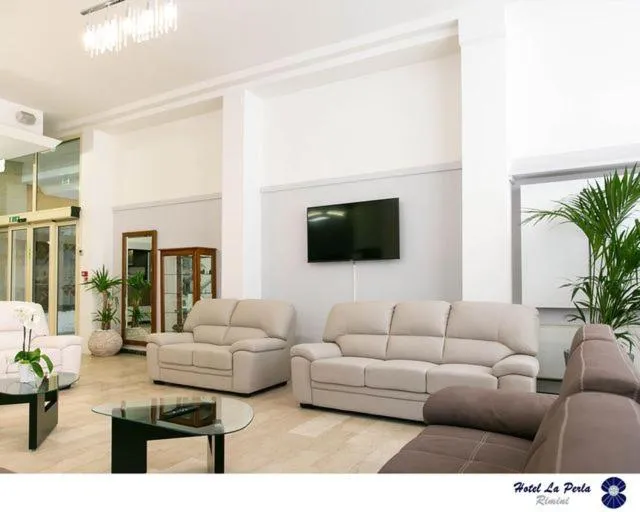 Communal lounge/ TV room in Hotel La Perla Rimini