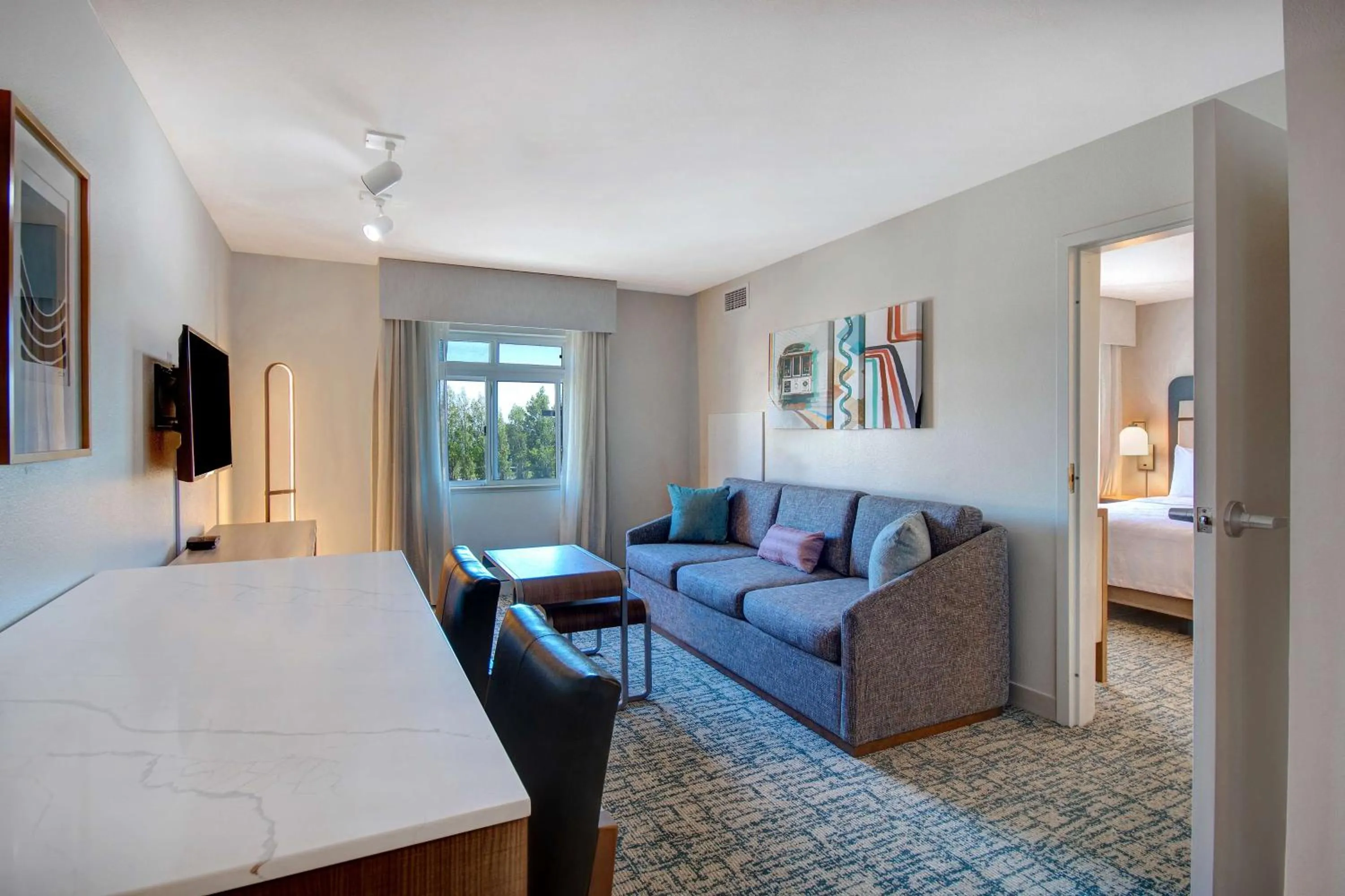 Living room, Bed in Homewood Suites by Hilton San Francisco Airport North California