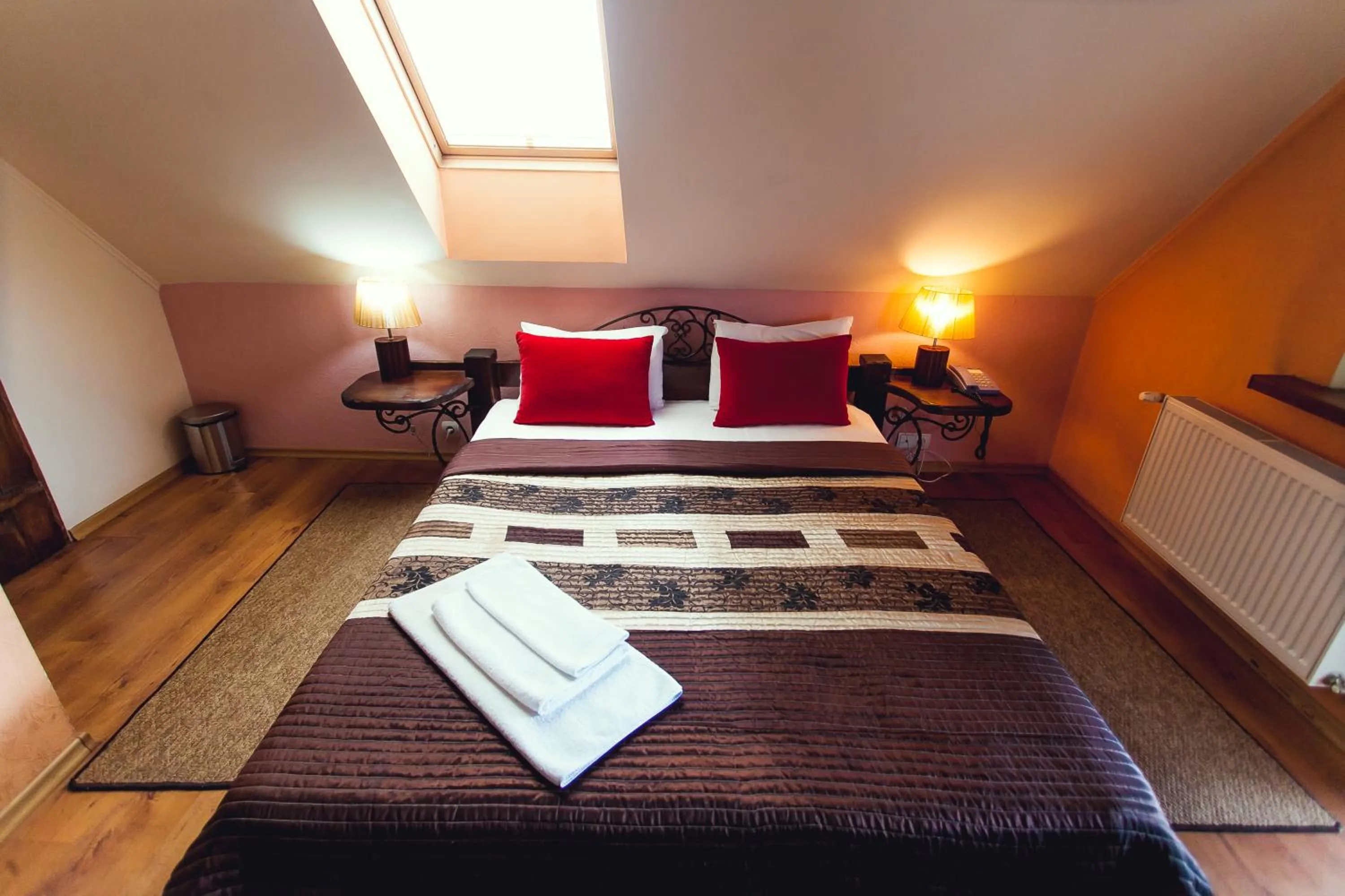 Bed in Art-Rustic Boutique Hotel