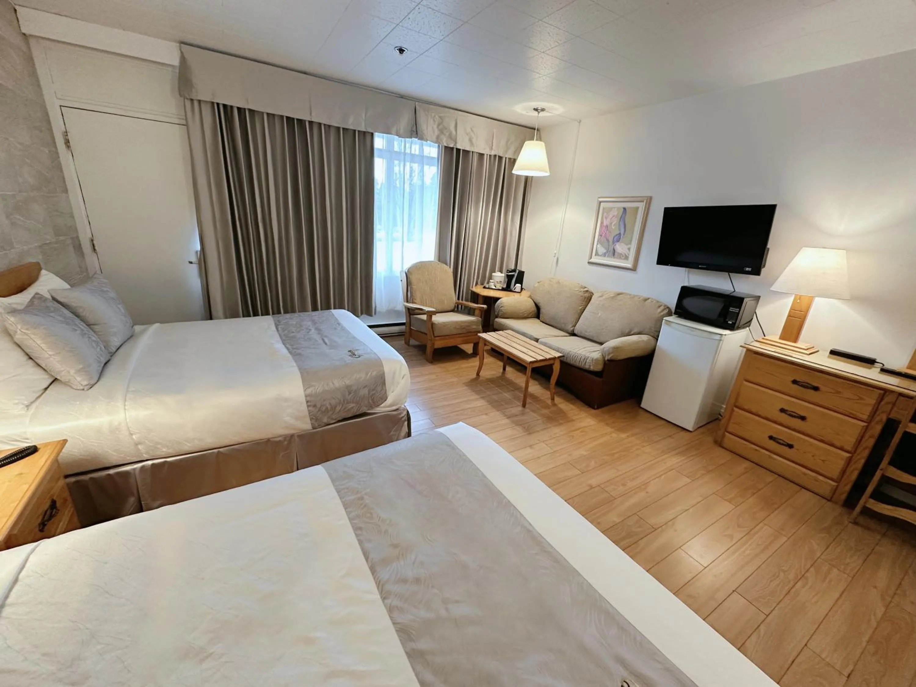 TV and multimedia, Bed in Hotel La Caravelle