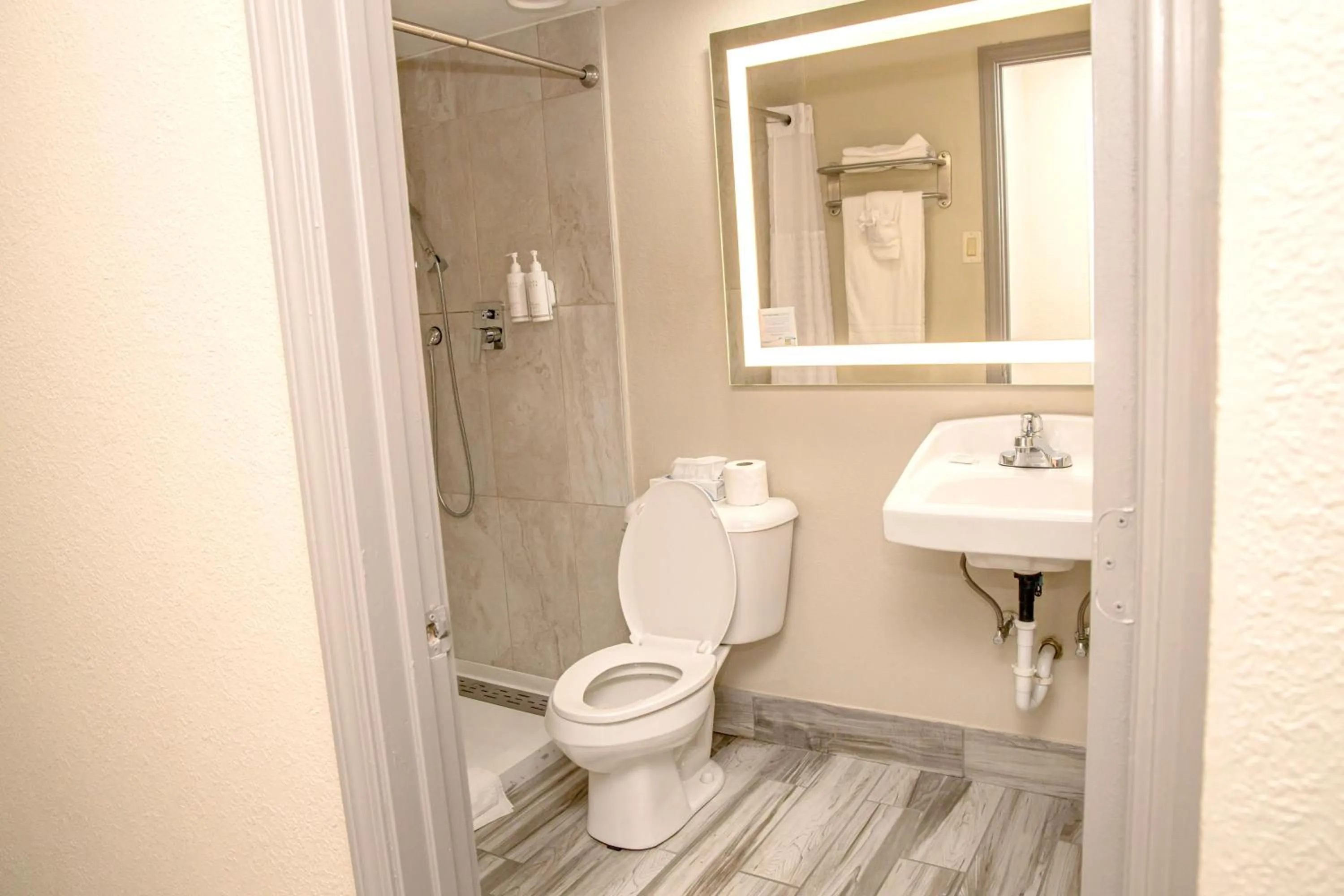 Bathroom in Days Inn and Suites by Wyndham Hammond, IN