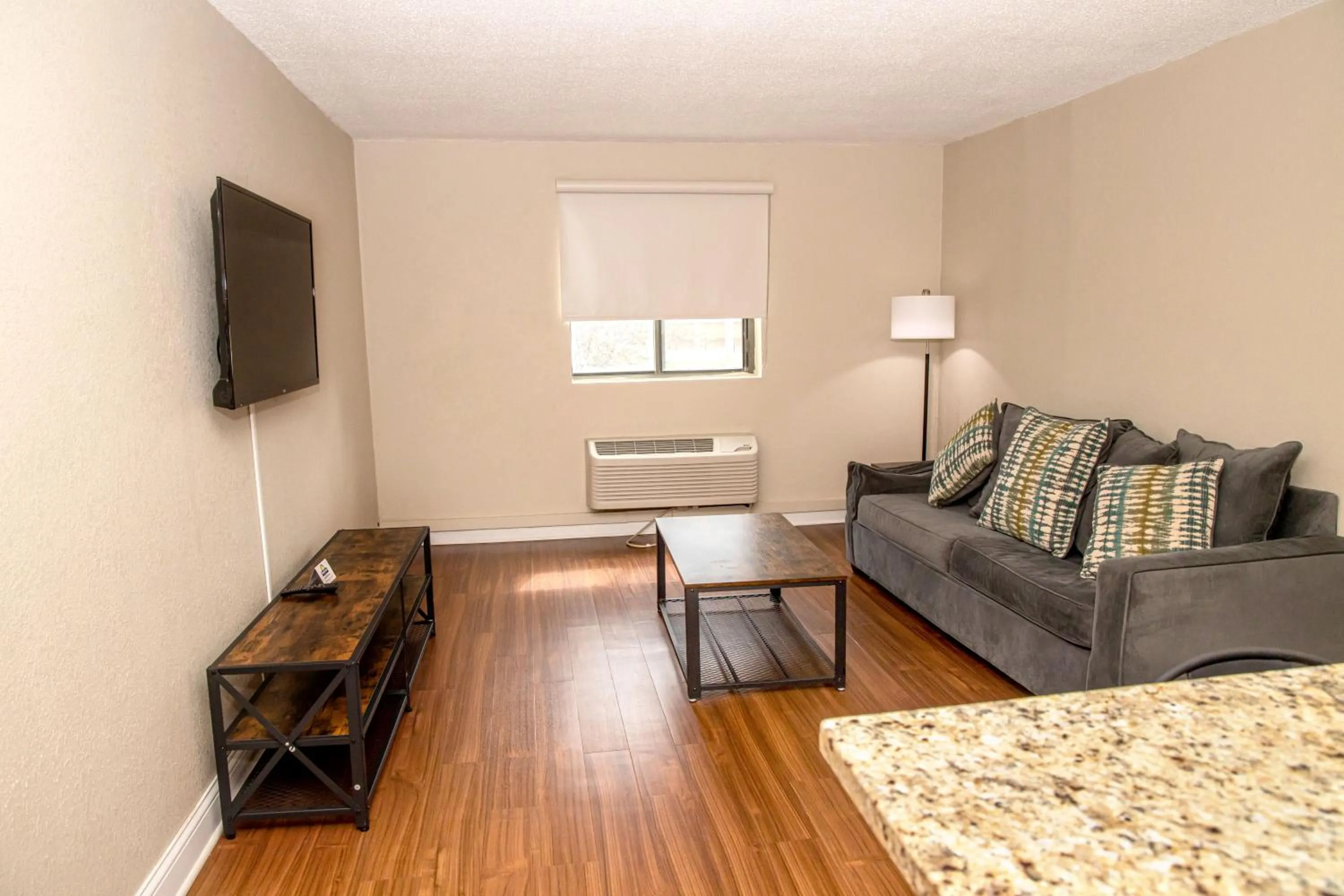 Seating area in Days Inn and Suites by Wyndham Hammond, IN