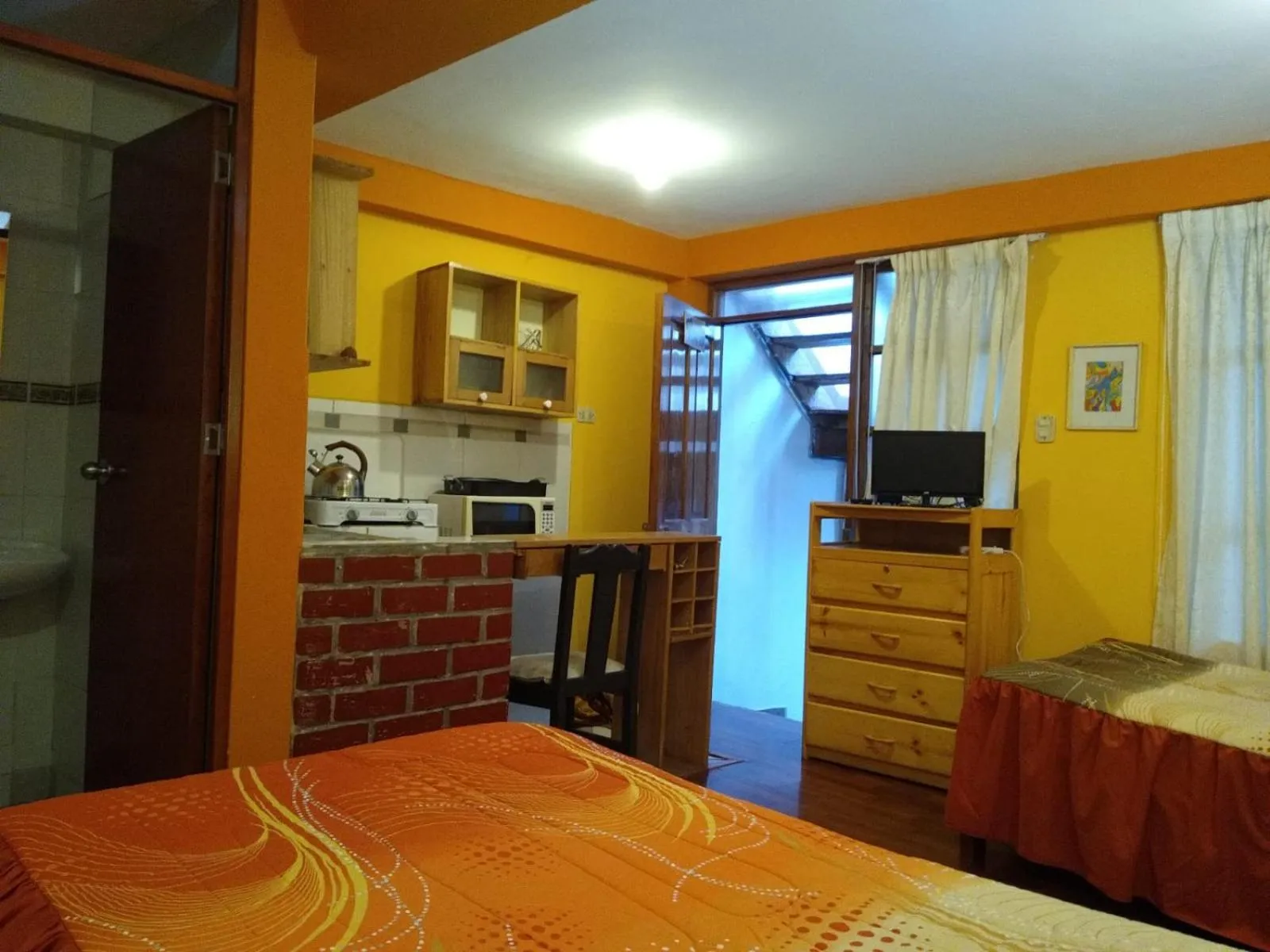 Kitchen or kitchenette, Bed in Casa De Mama Cusco - The Treehouse
