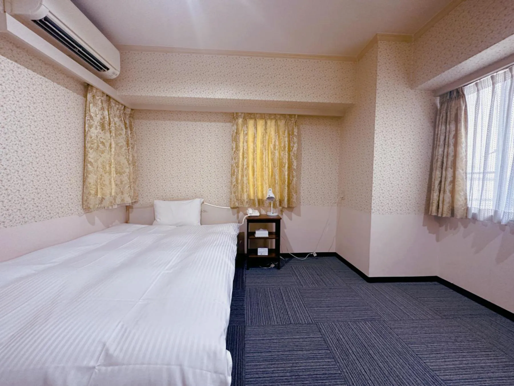 Photo of the whole room, Bed in Nissei Hotel Fukuoka