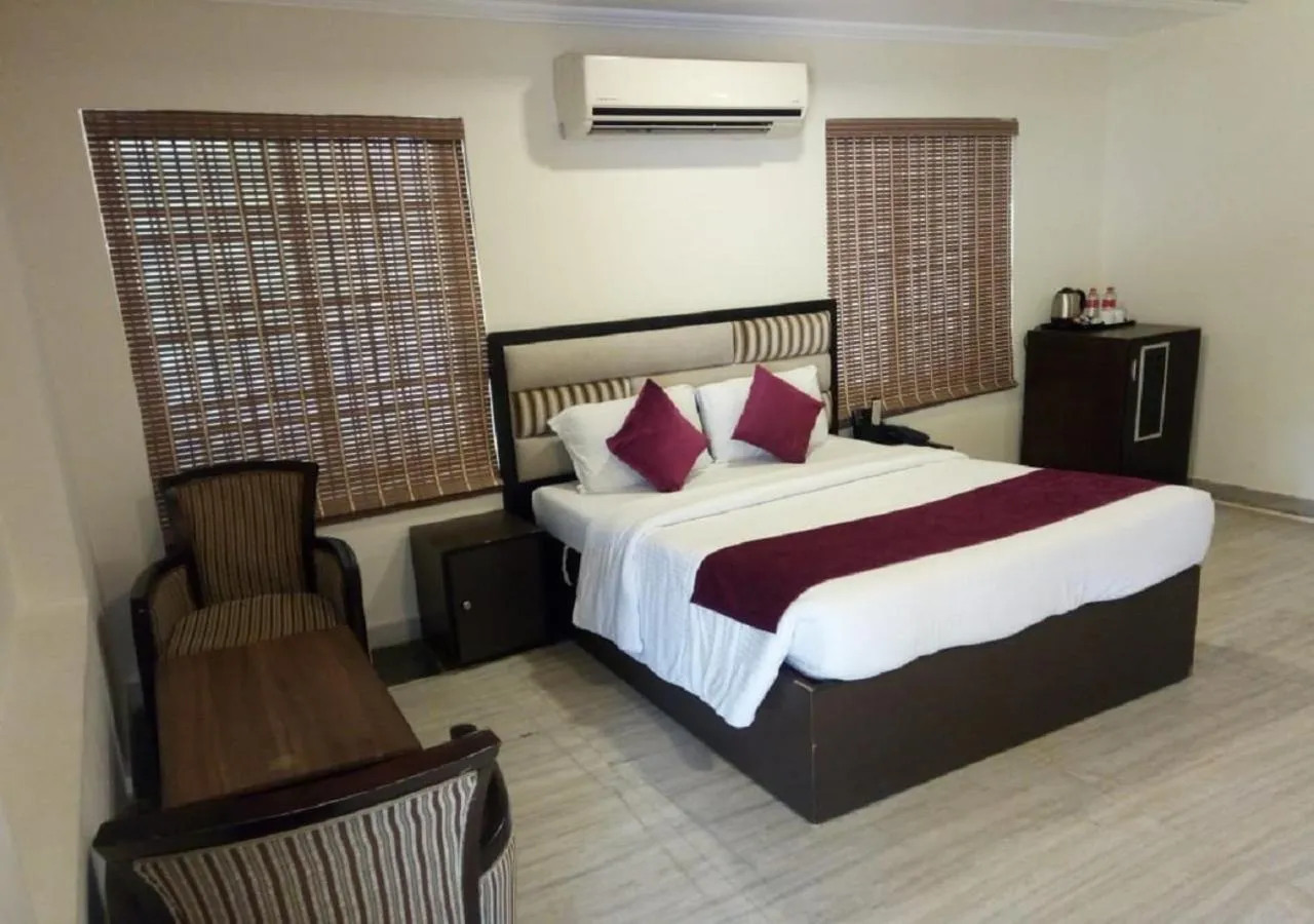 Bedroom, Bed in Mermaid Resorts & Banquets