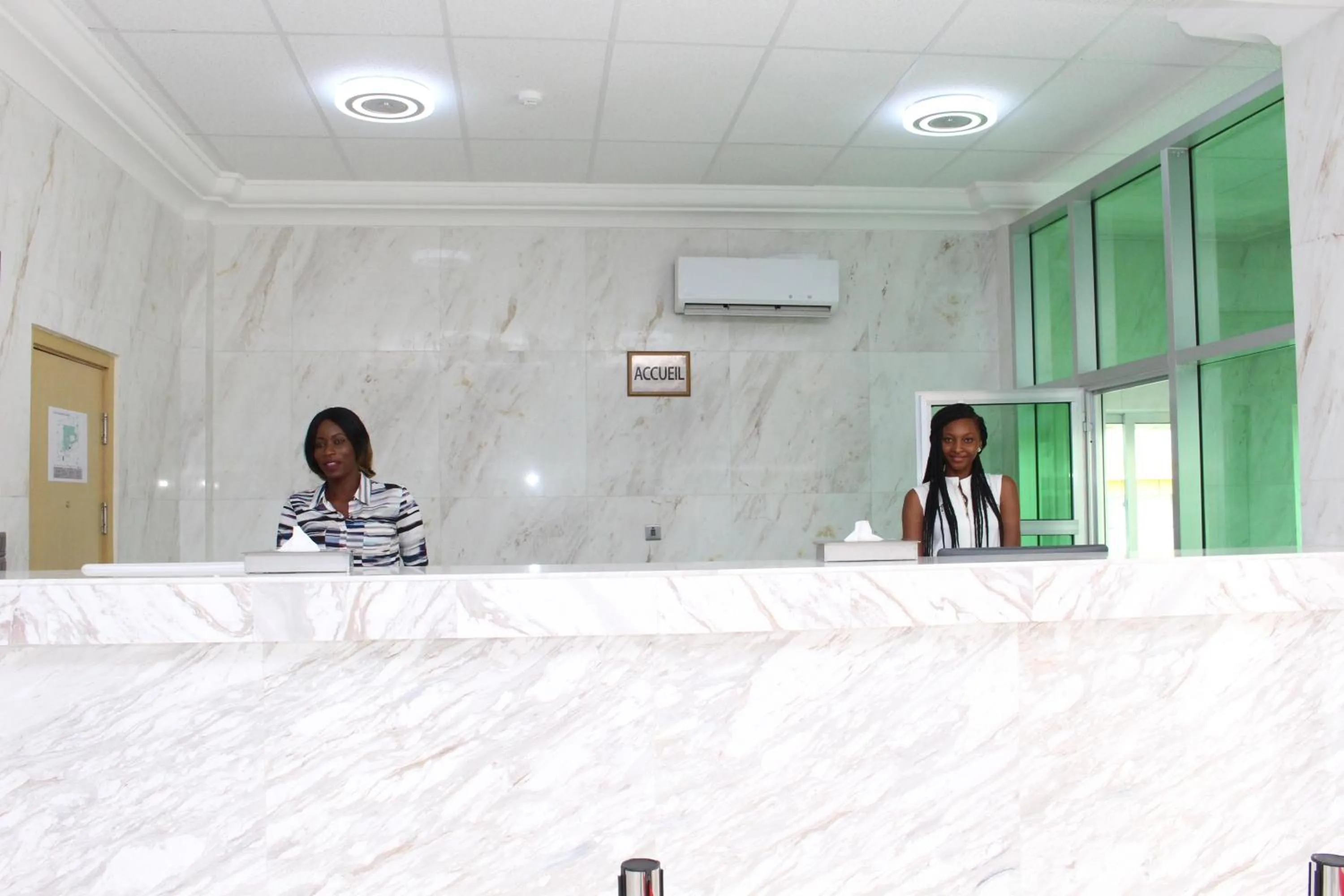 Lobby or reception in Paradisia Hotel