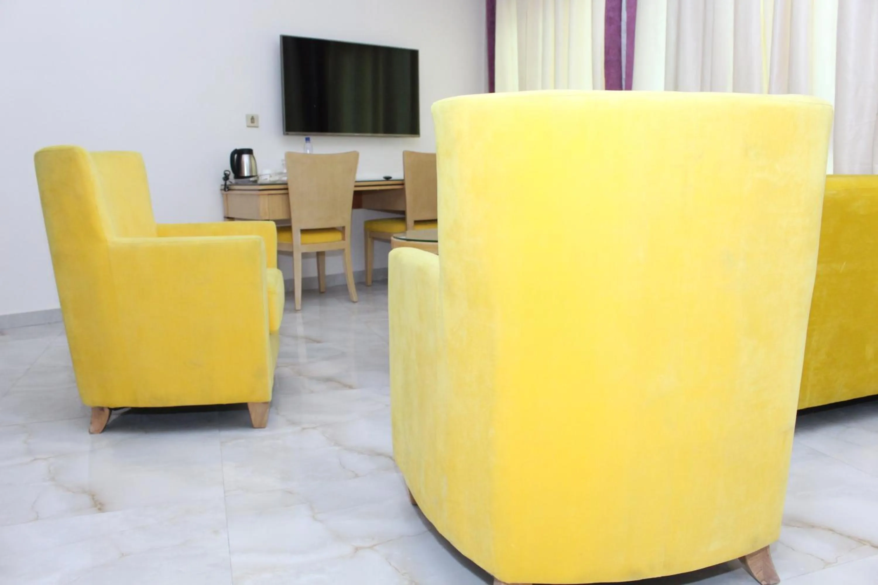 Living room in Paradisia Hotel