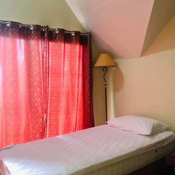 Bed in Skyland Garden Hotel and Resort