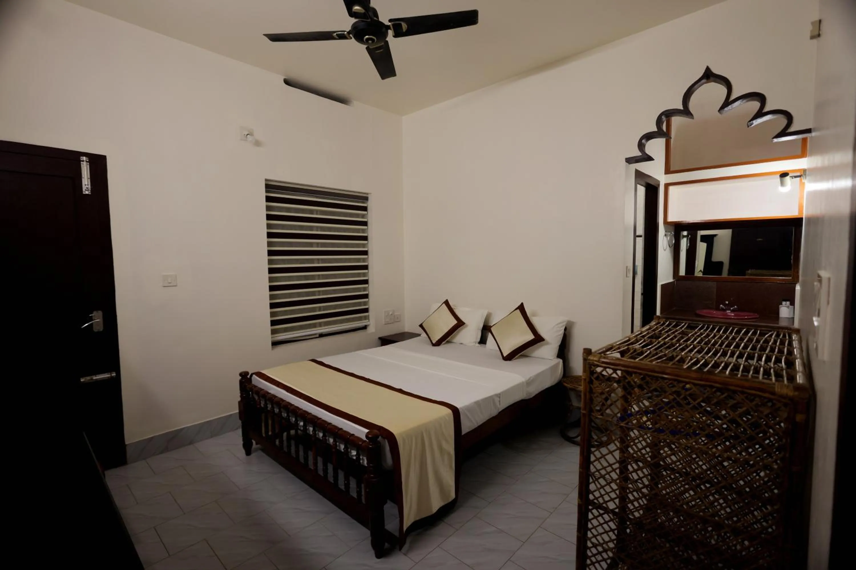 Bed in Ideal Ayurvedic Resort Kovalam