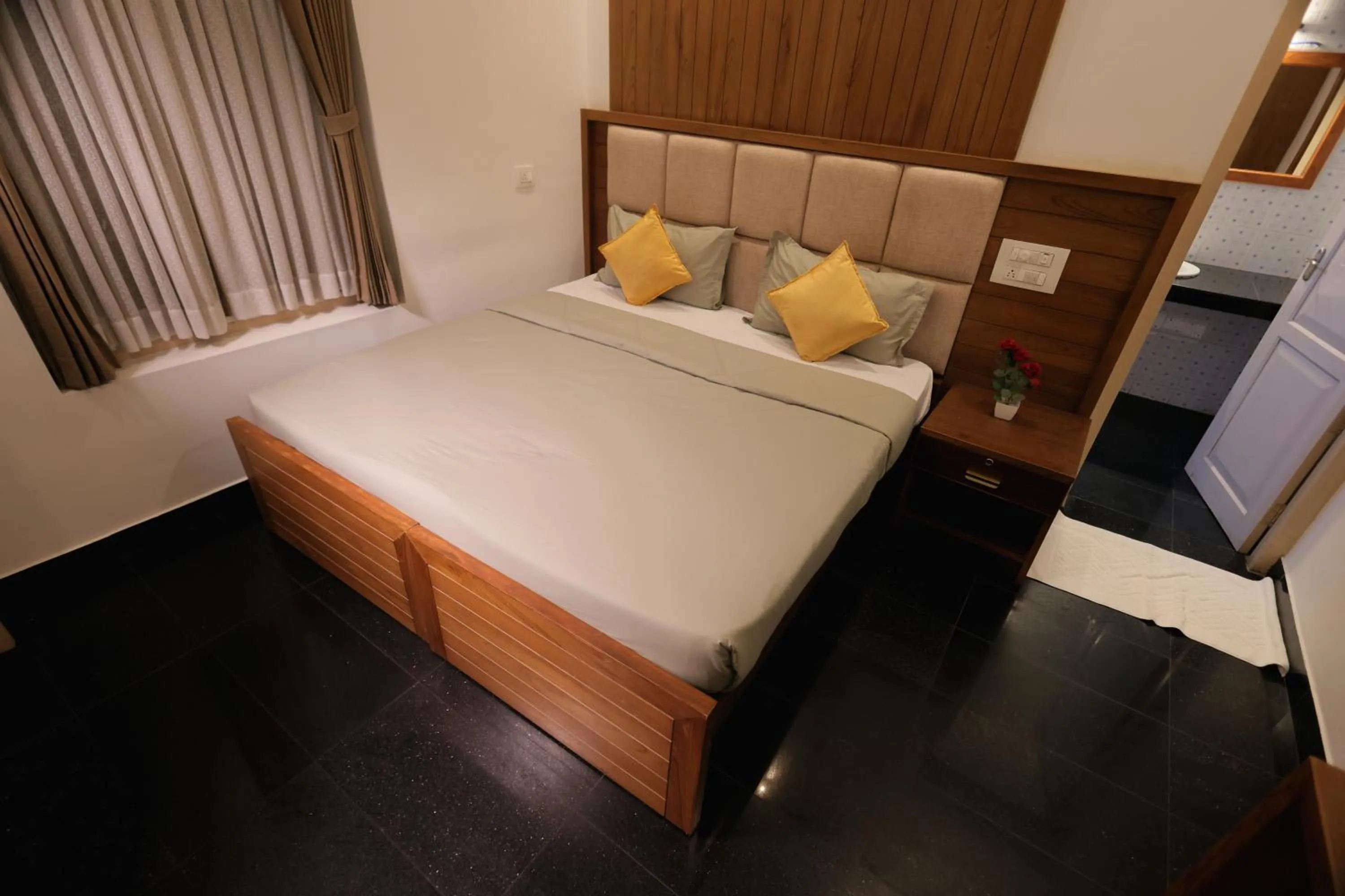 Bed in Ideal Ayurvedic Resort Kovalam