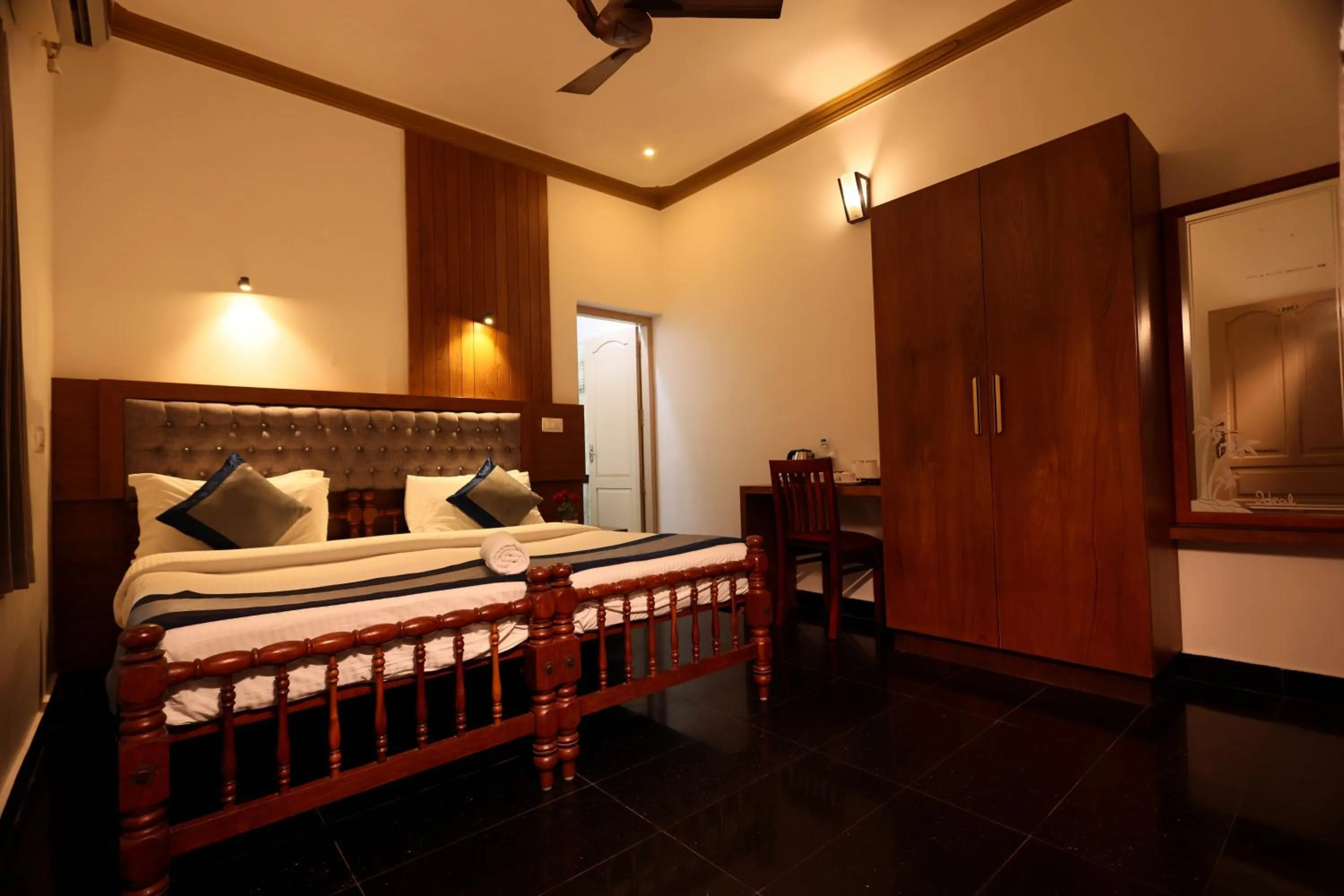 Bed in Ideal Ayurvedic Resort Kovalam