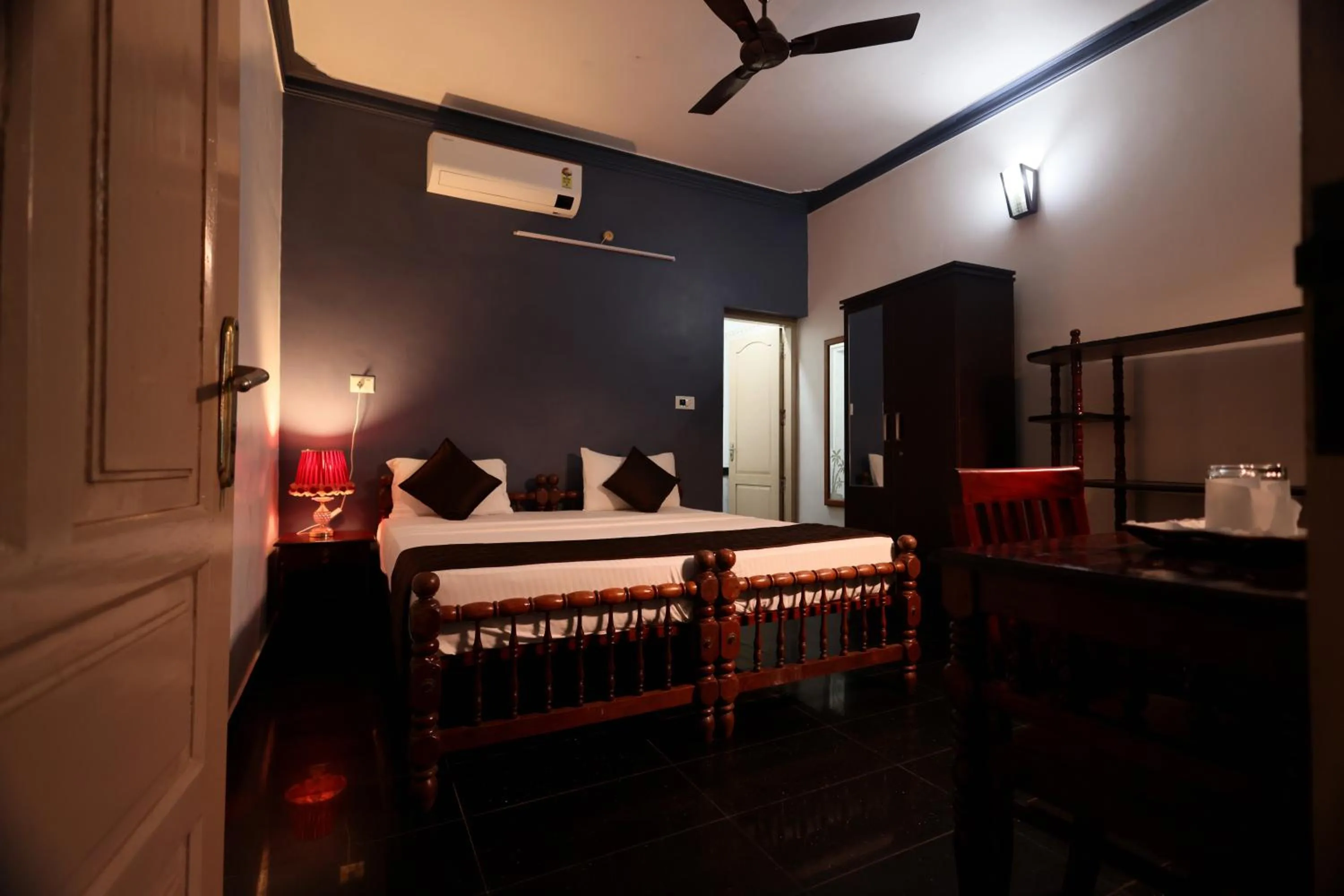 Bed in Ideal Ayurvedic Resort Kovalam