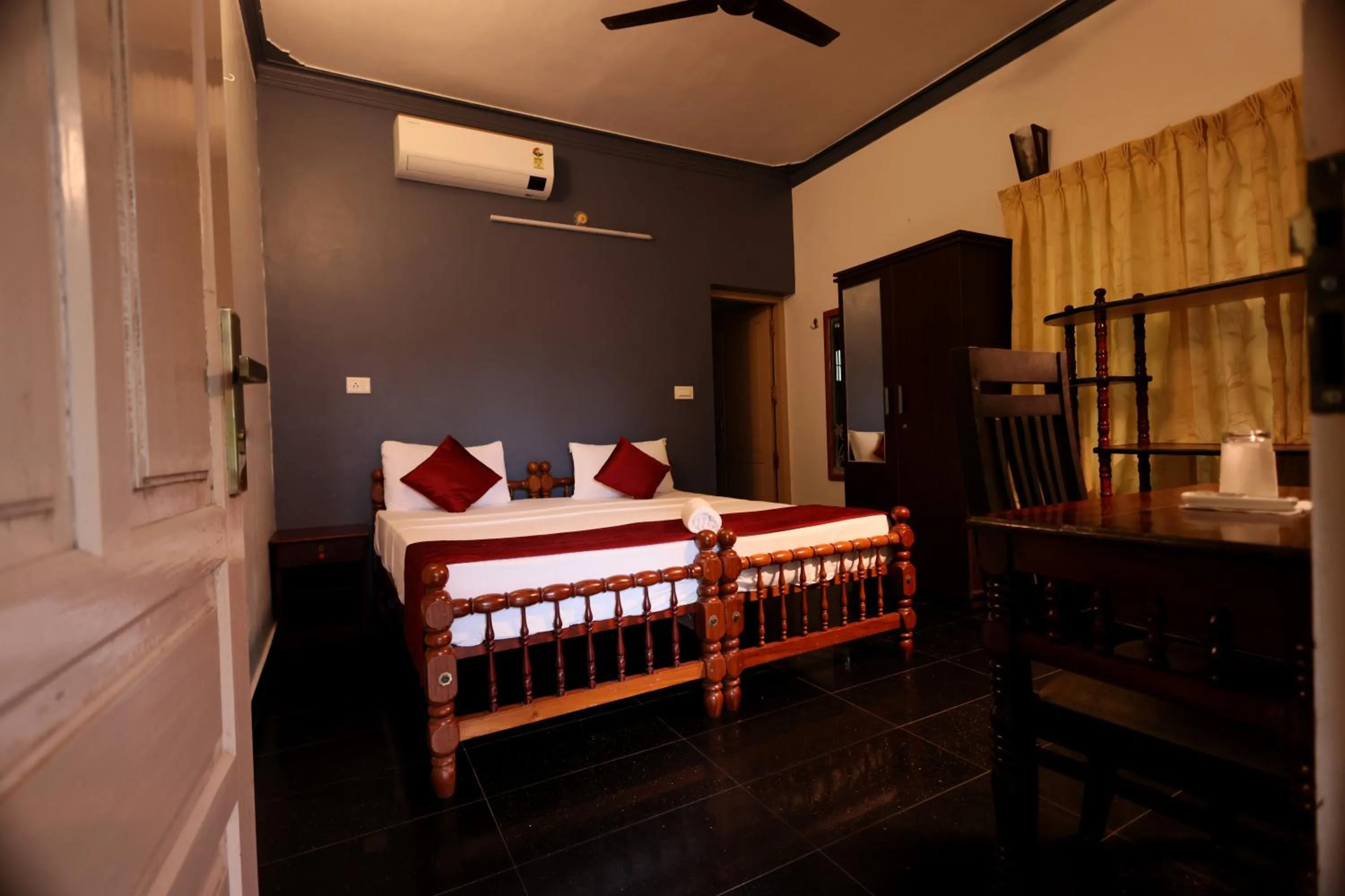 Bed in Ideal Ayurvedic Resort Kovalam