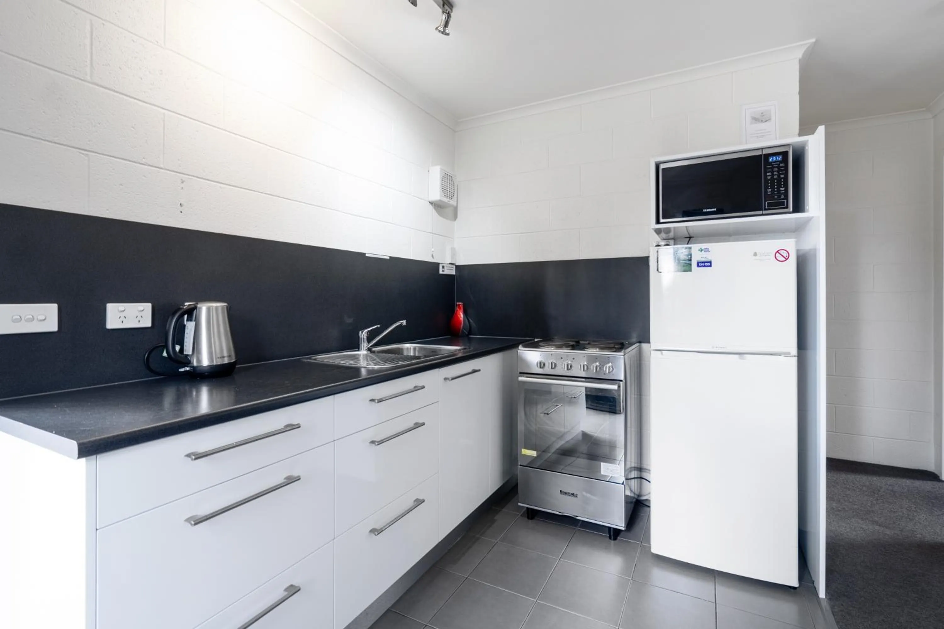 Kitchen or kitchenette in Graham Apartments