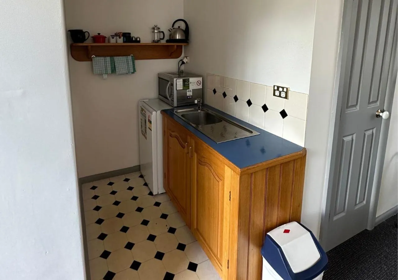 Kitchen or kitchenette in Graham Apartments