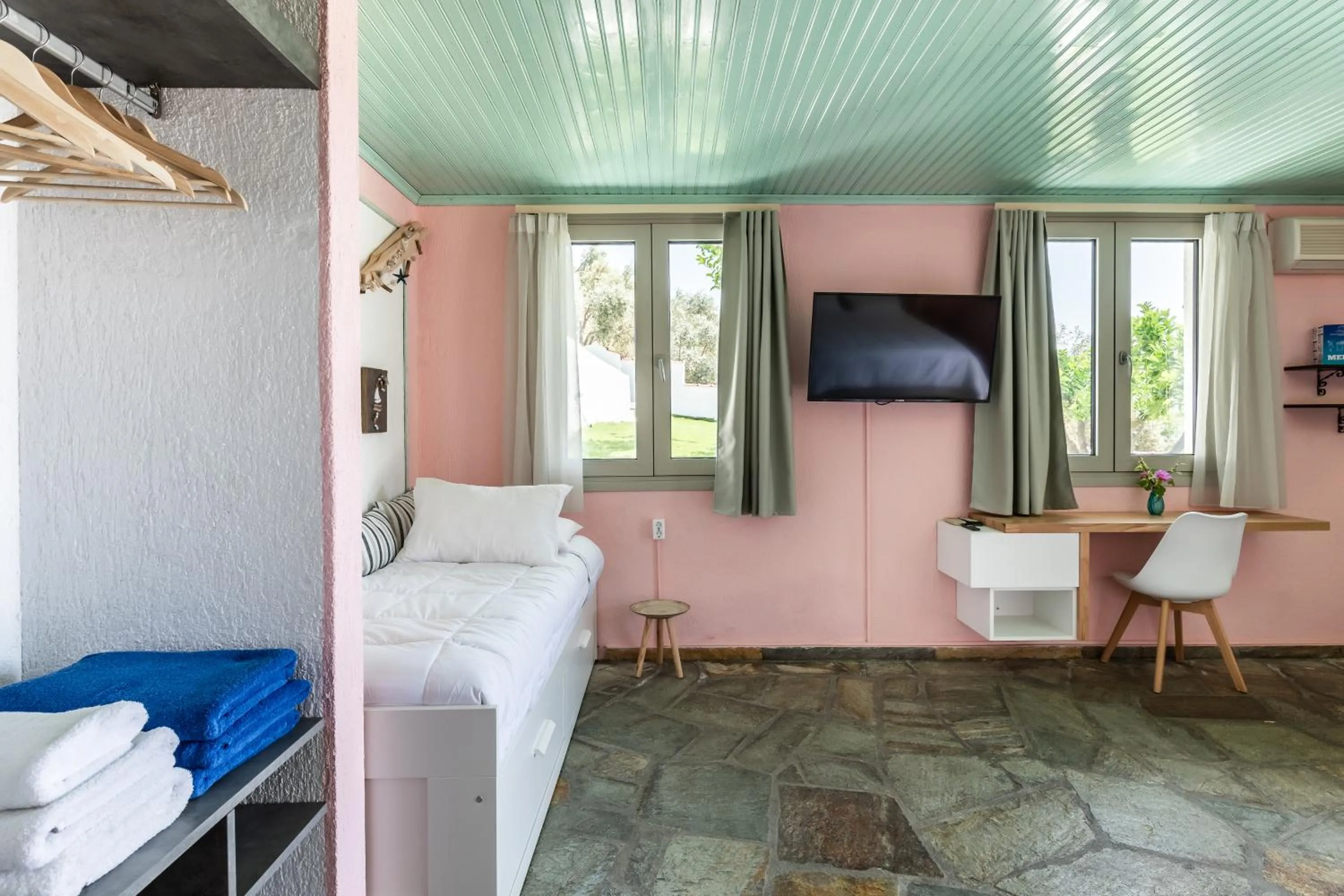 Living room, Bed in Panormos Beach Hotel Skopelos