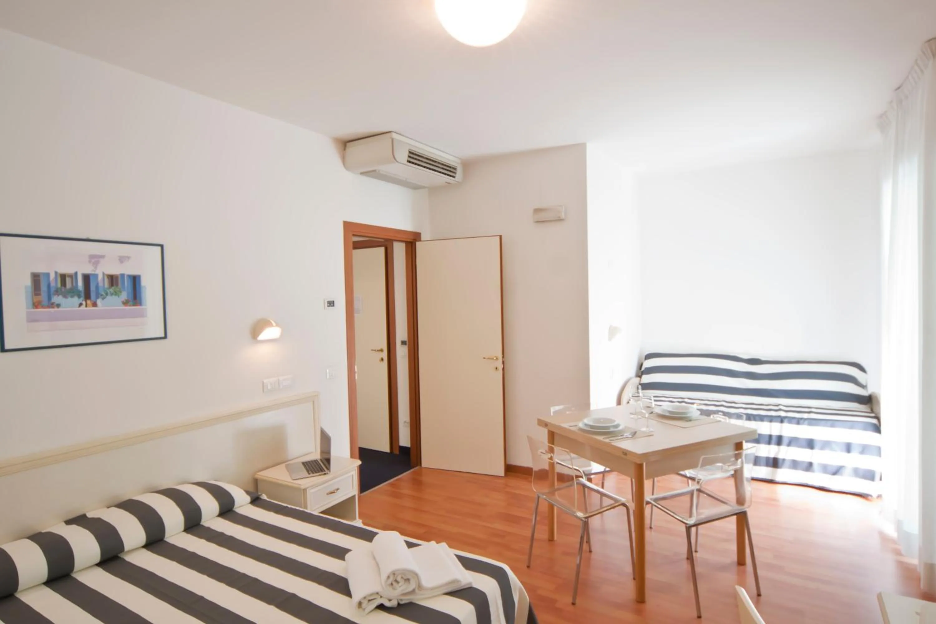 Photo of the whole room in Residence Divina