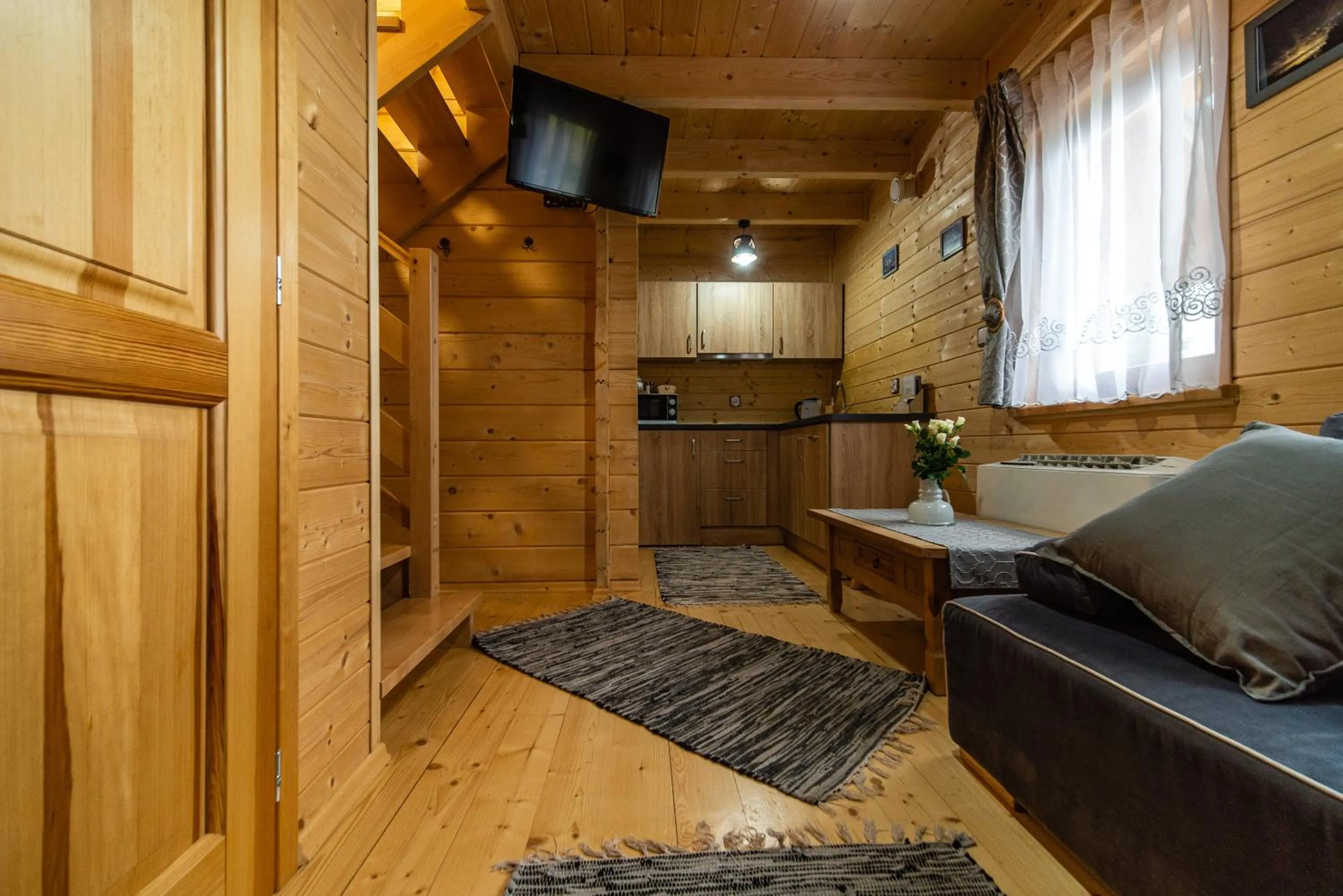 Communal lounge/ TV room in Eko domki MaMastra Szaflary