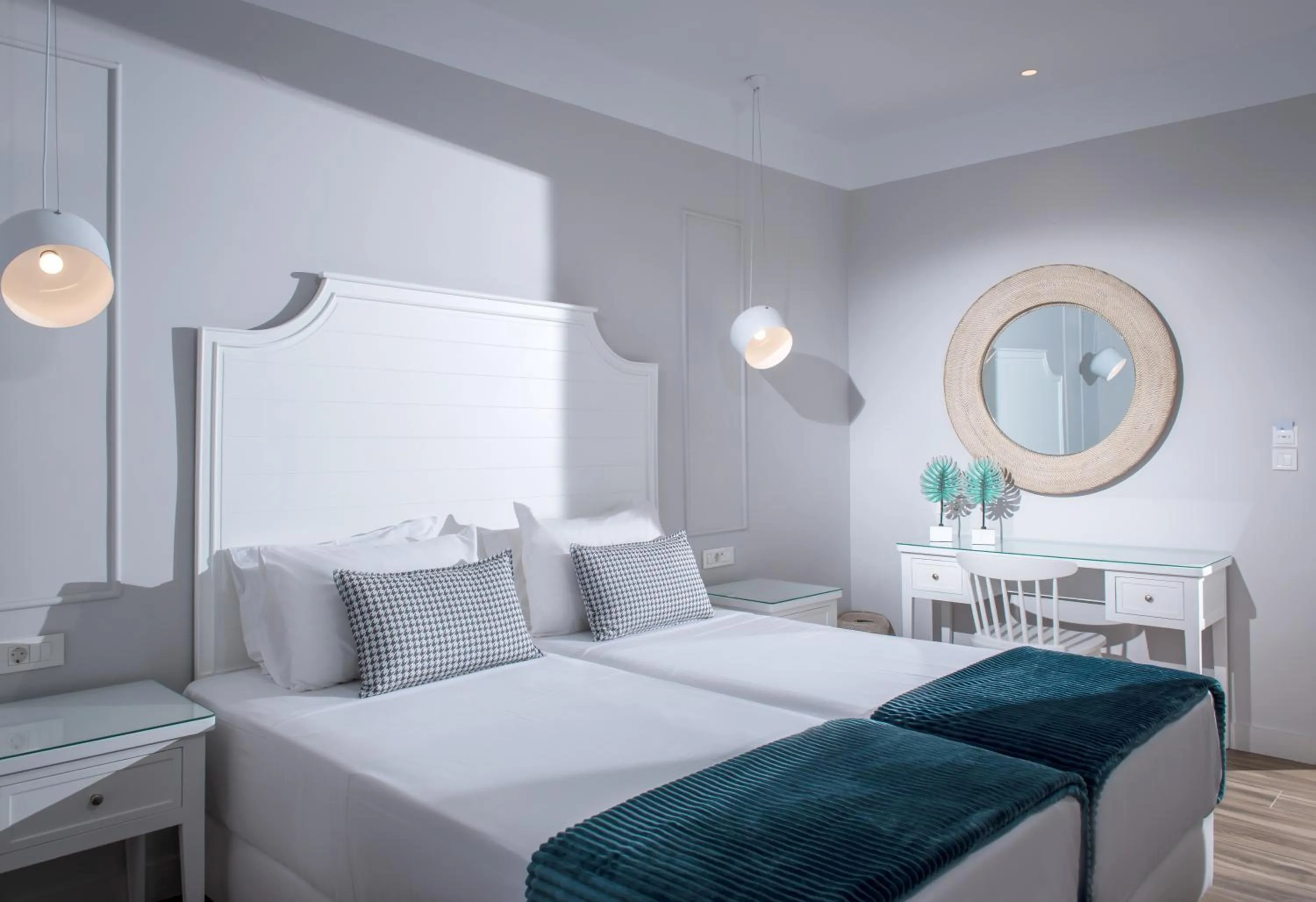 Bed in Mari Kristin Beach Hotel