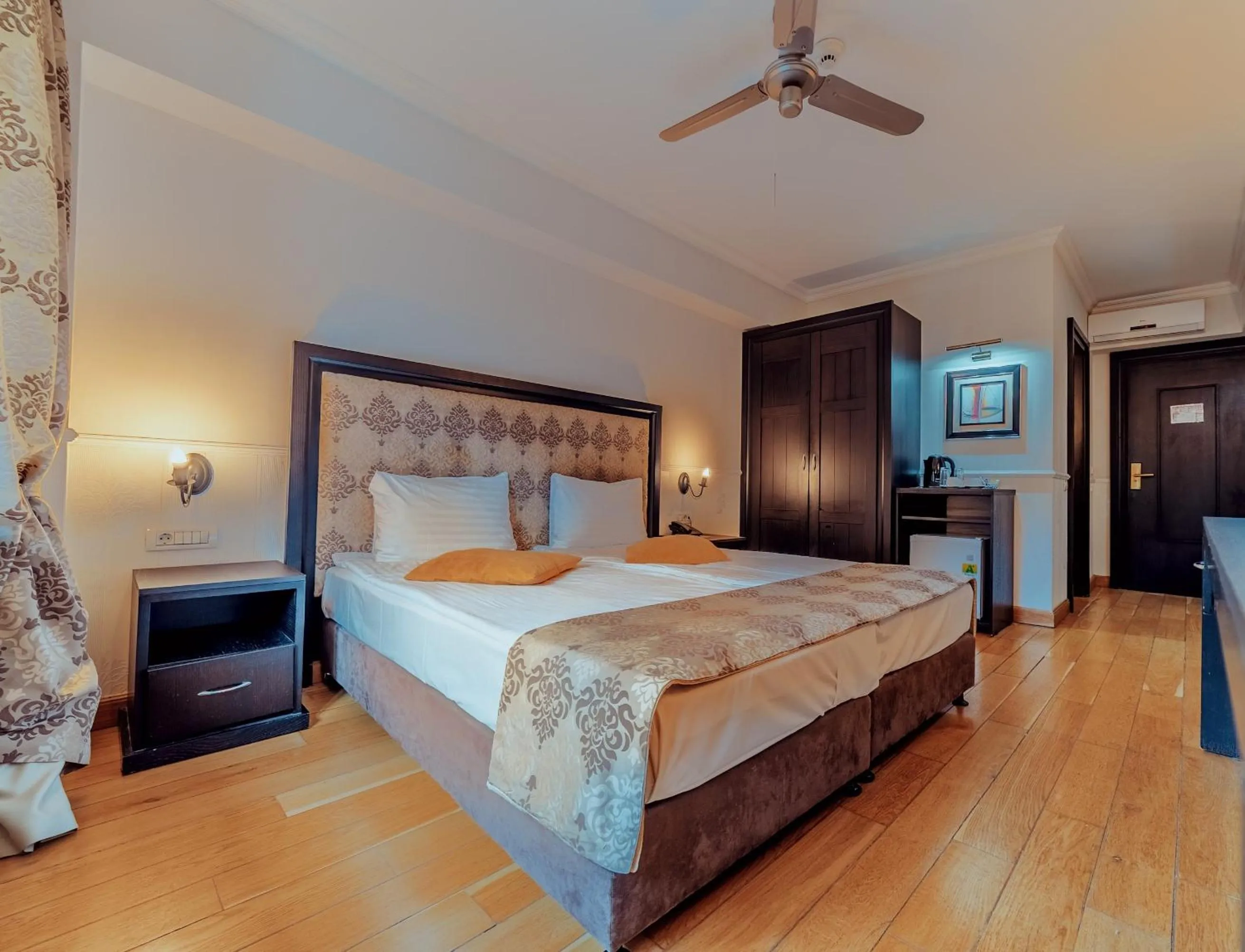 Bed in Rizzo Boutique Hotel