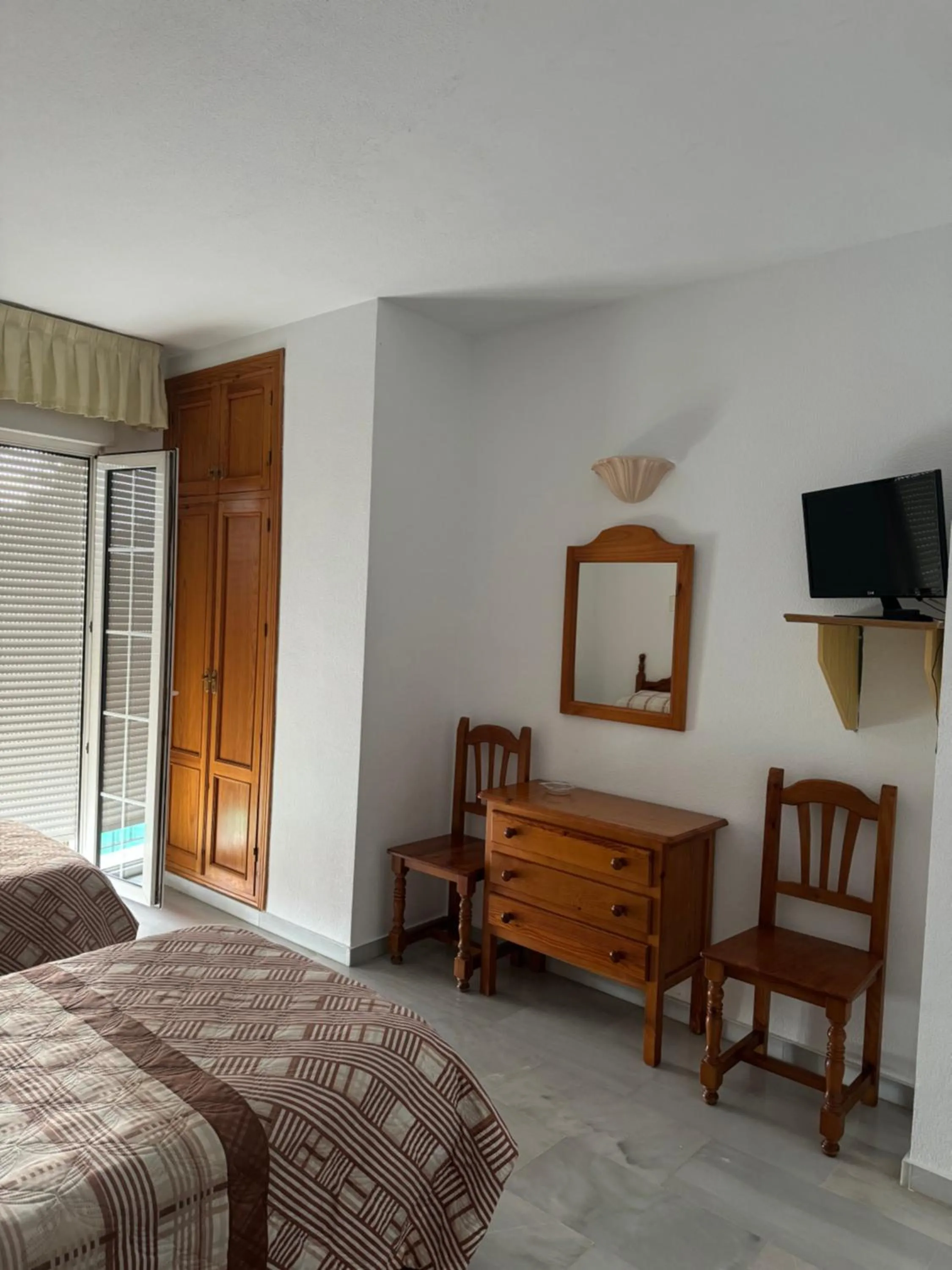 Bed in Hotel Mirasol