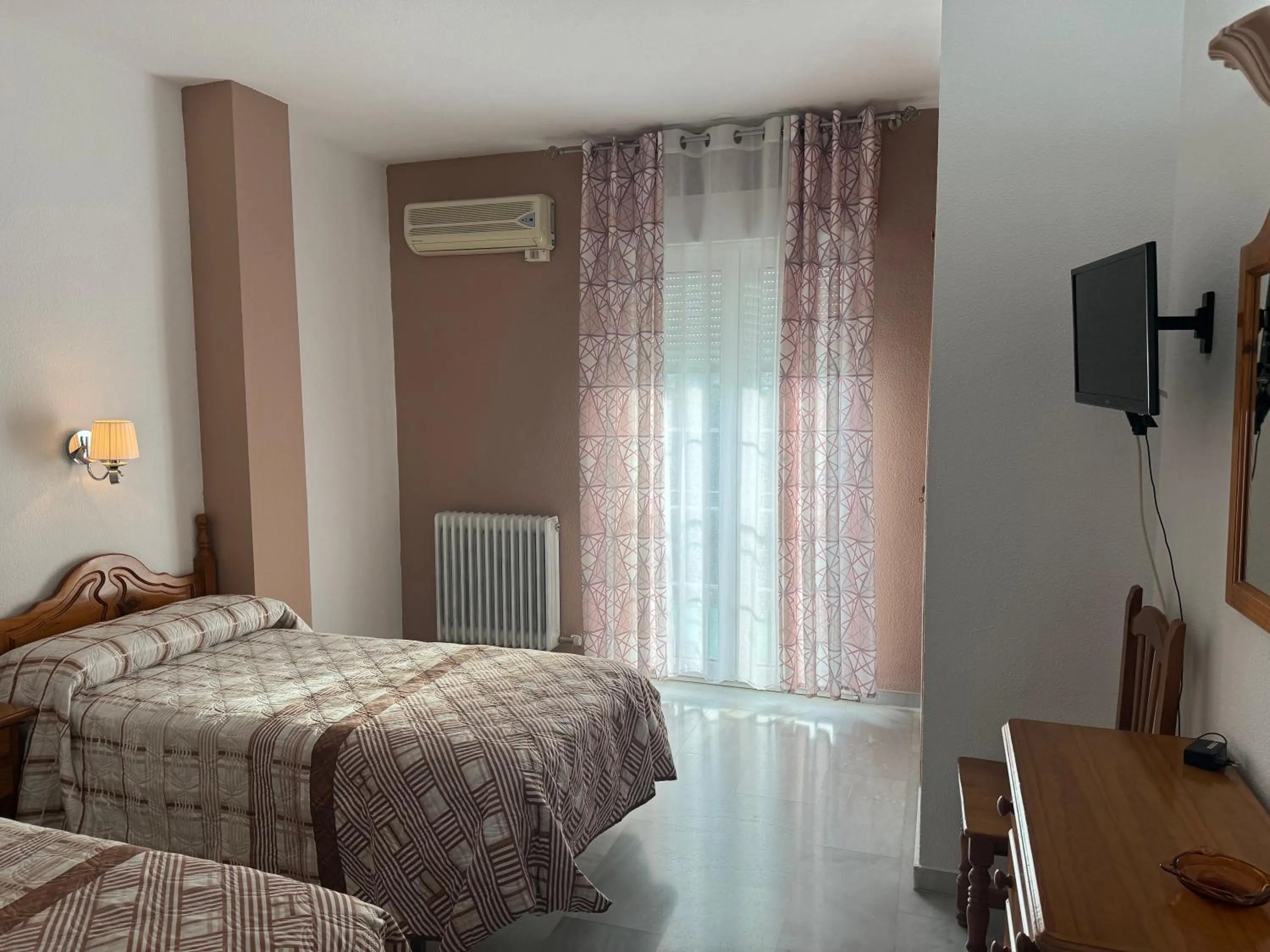 Bed in Hotel Mirasol