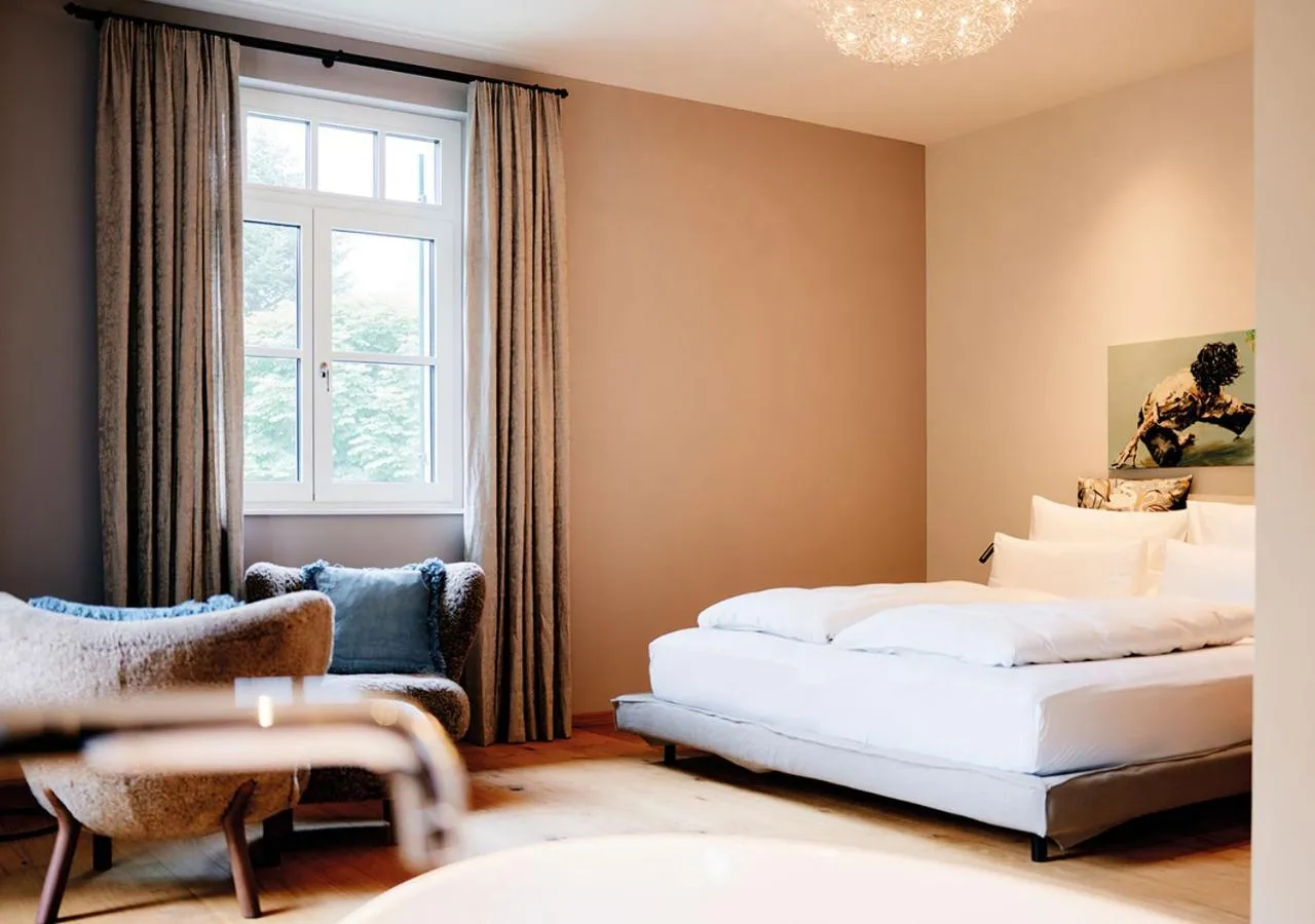 Photo of the whole room, Bed in TAUROA Landhaus zu Appesbach