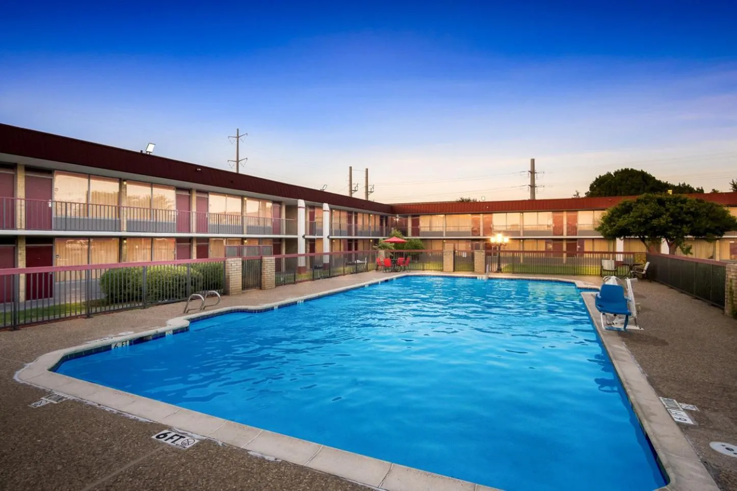 Swimming pool in Red Roof Inn & Conference Center McKinney