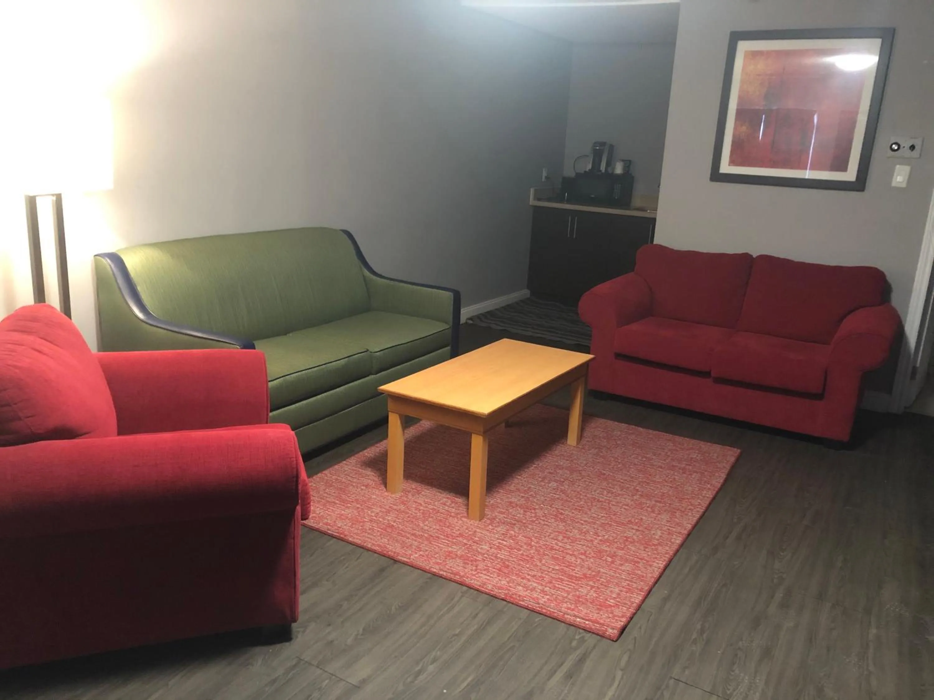 Living room in Ramada by Wyndham Jackson's Point