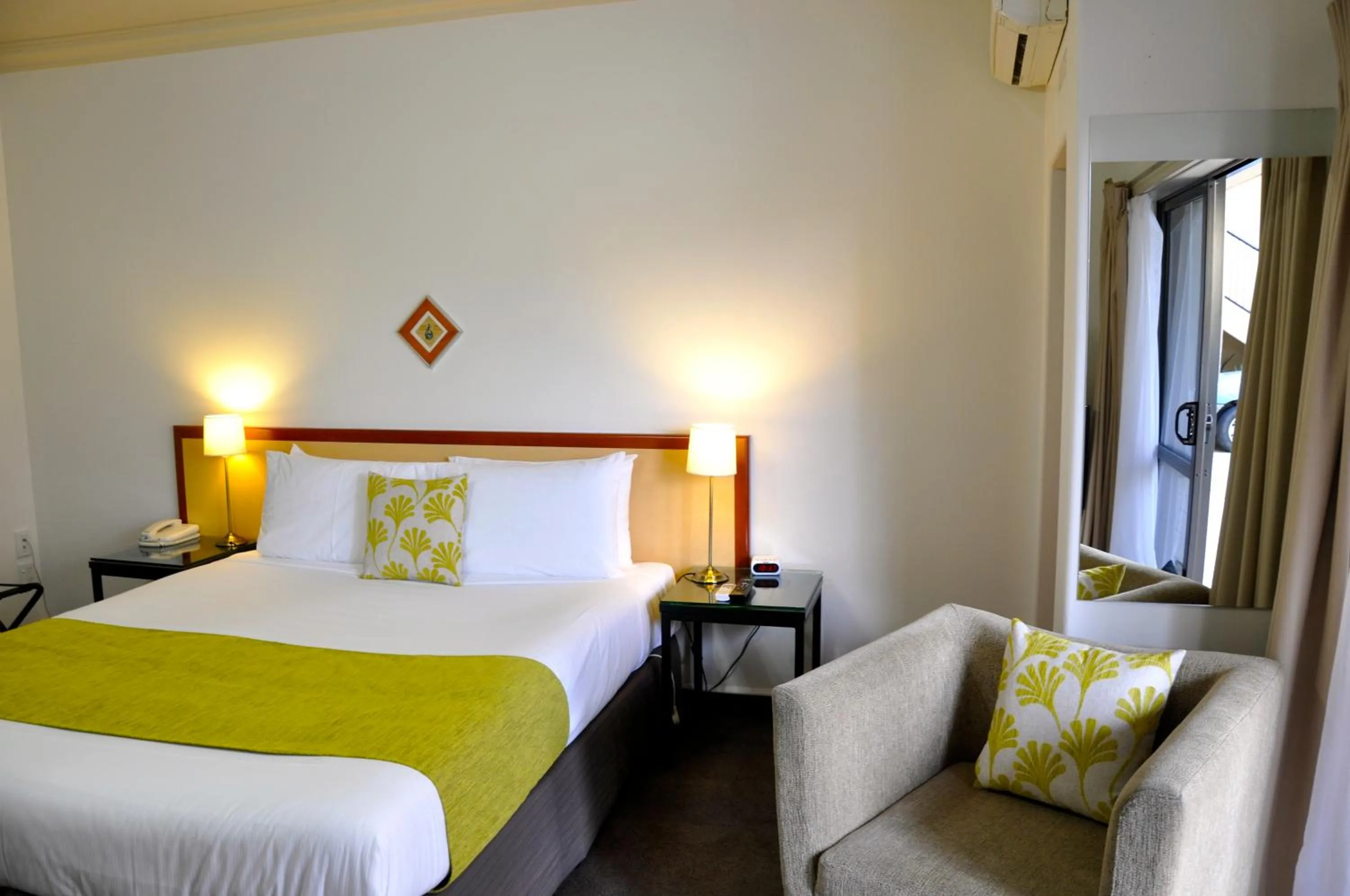 Bed in Tuscany Villas Whakatane