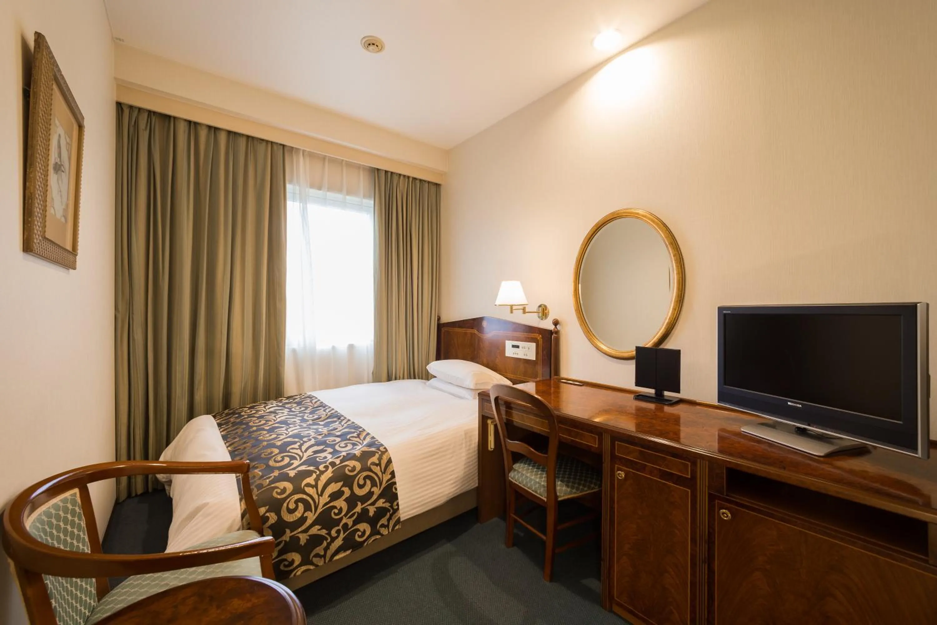 Bed in Dukes Hotel Nakasu