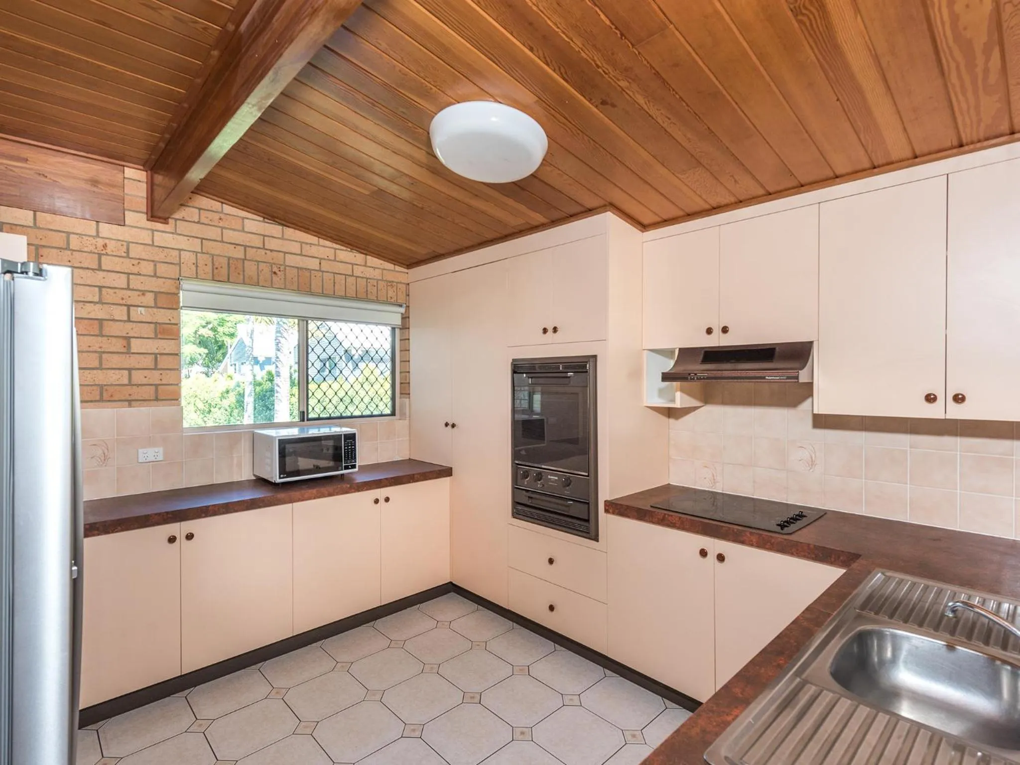 Kitchen or kitchenette in NRMA Woodgate Beach Holiday Park