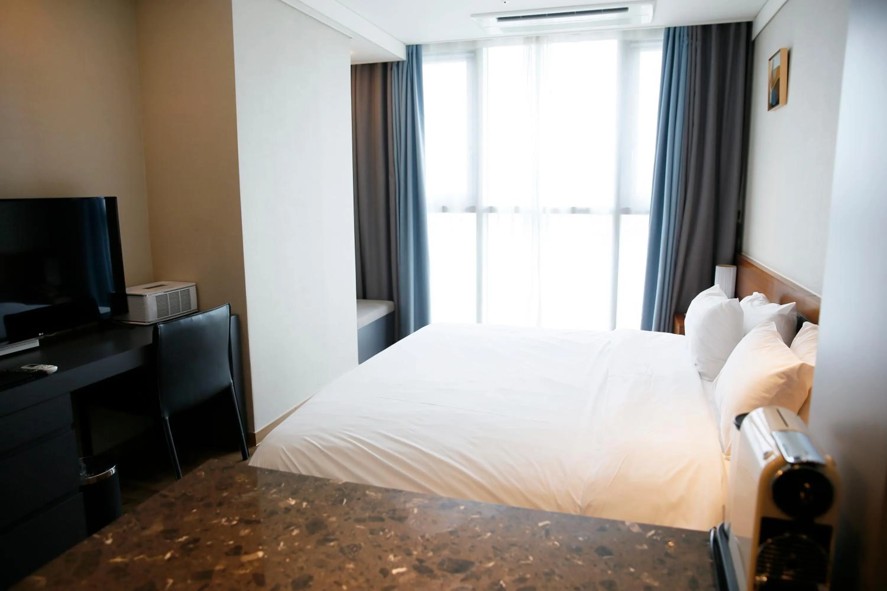 Bed in J One Hotel Cheongju