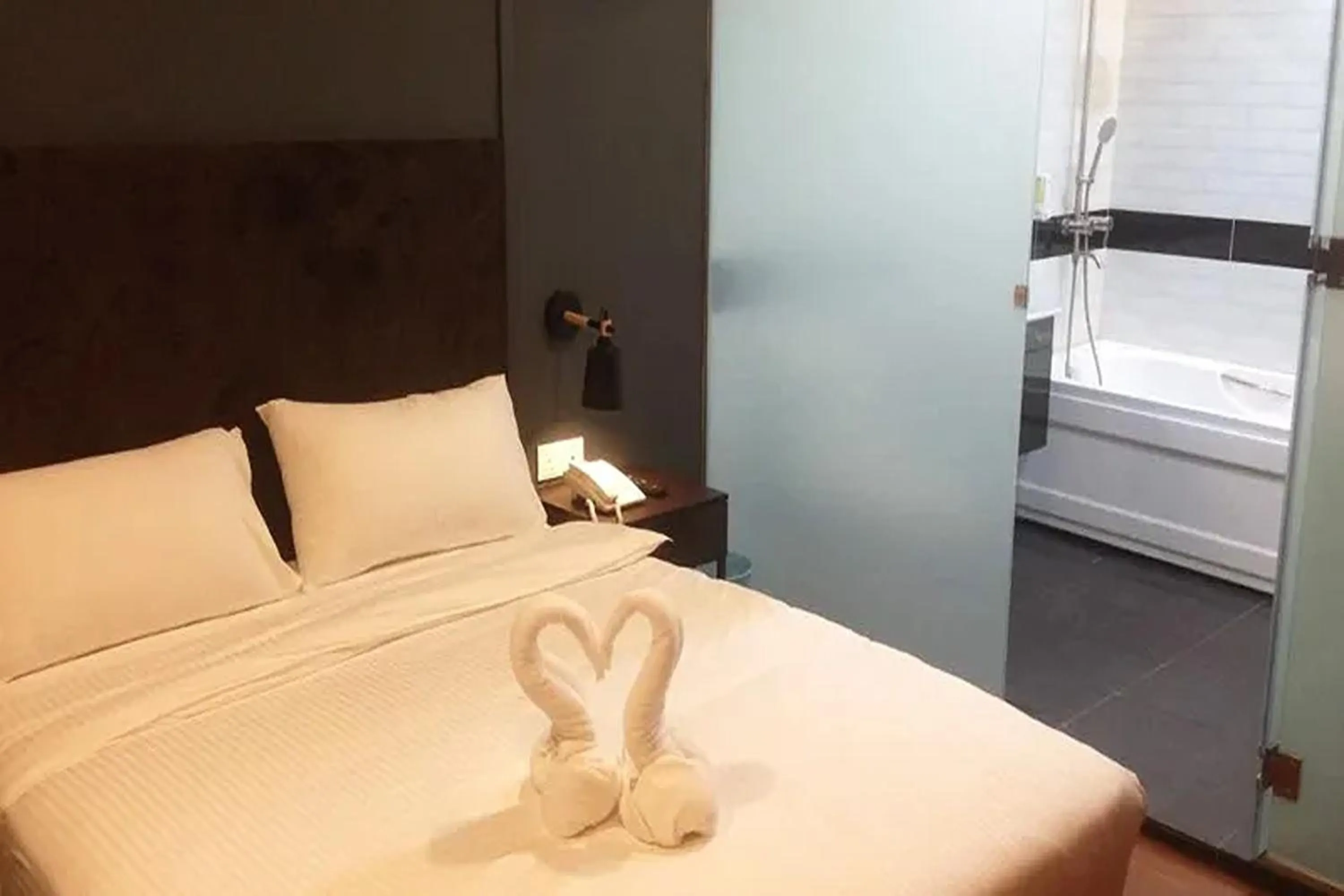 Bed in Jenjarom Boutique Hotel