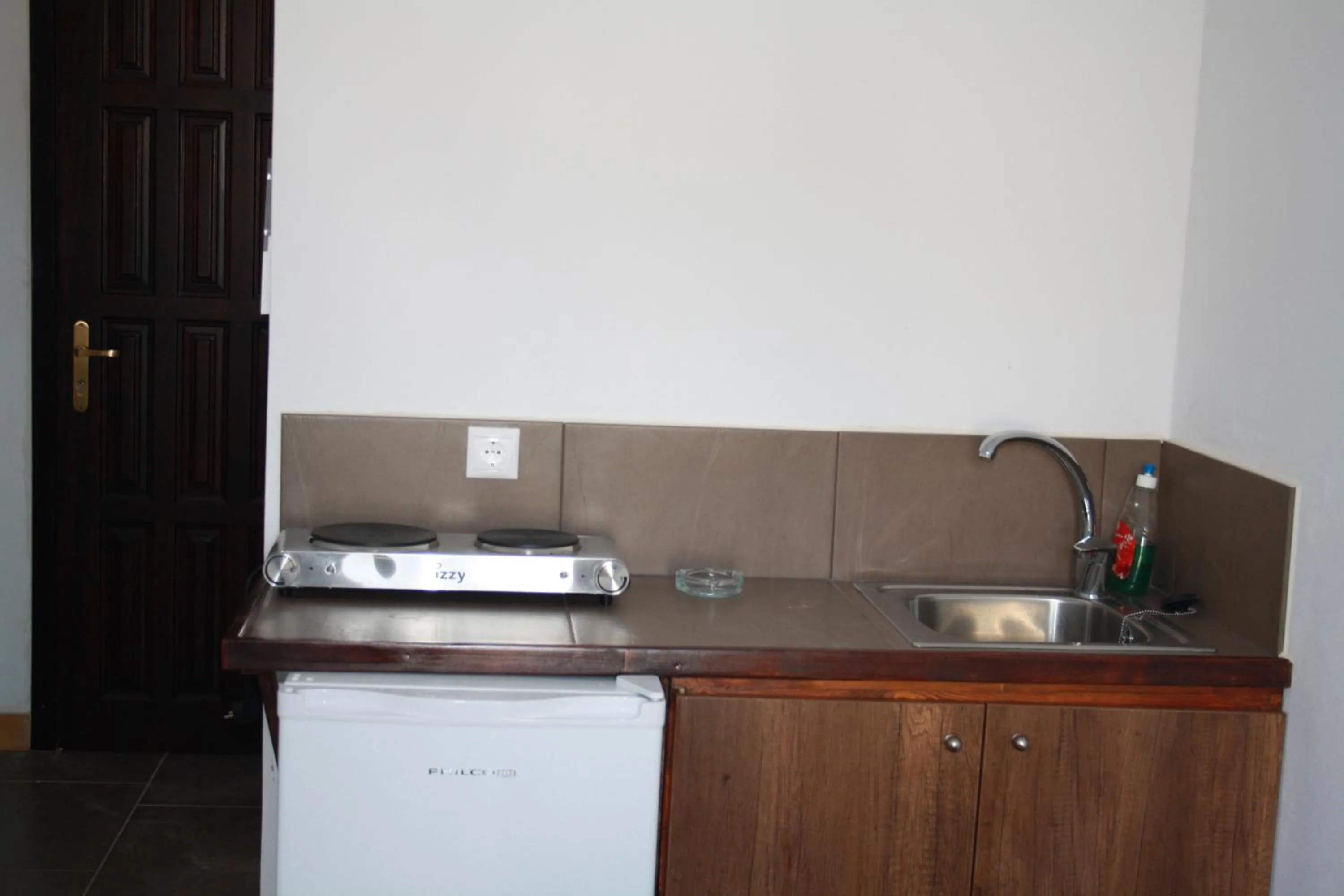 Kitchen or kitchenette in Amorani Studios
