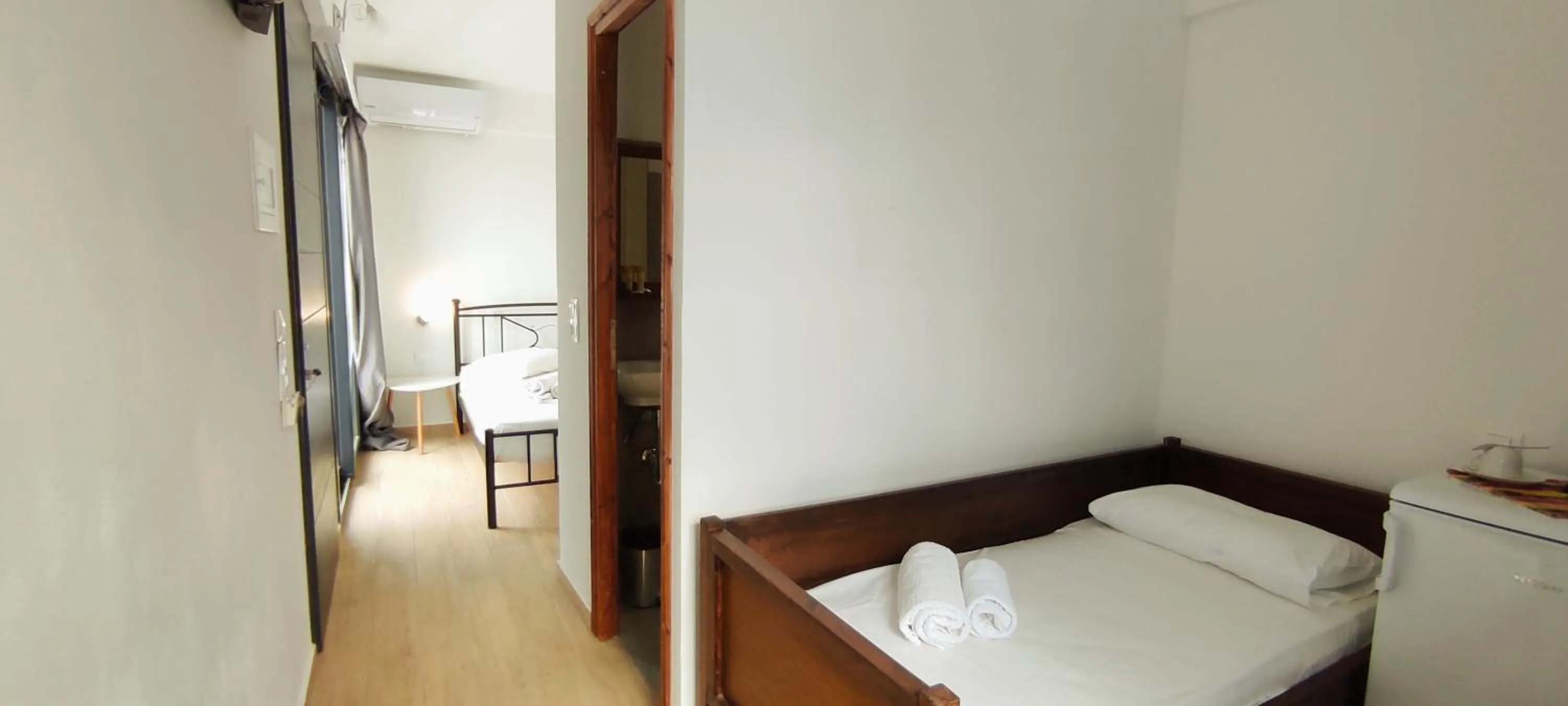 Photo of the whole room, Bed in Amorani Studios