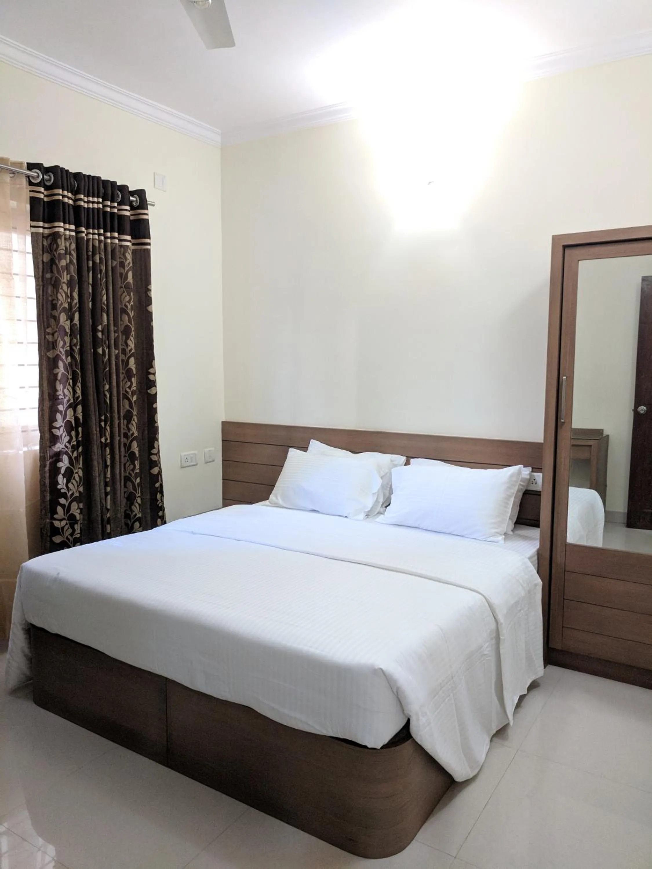 Bed in Clyford Suites