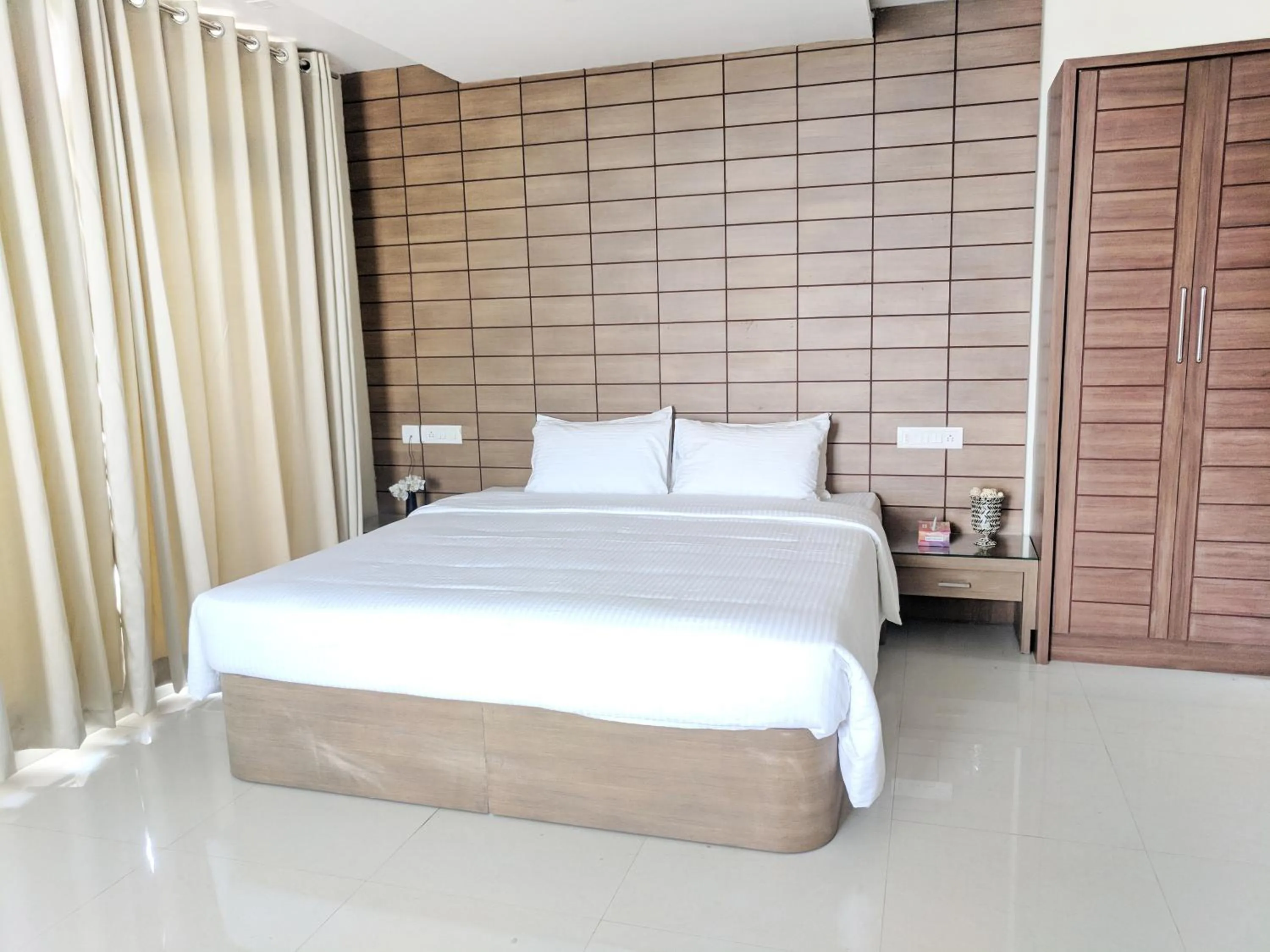 Bed in Clyford Suites