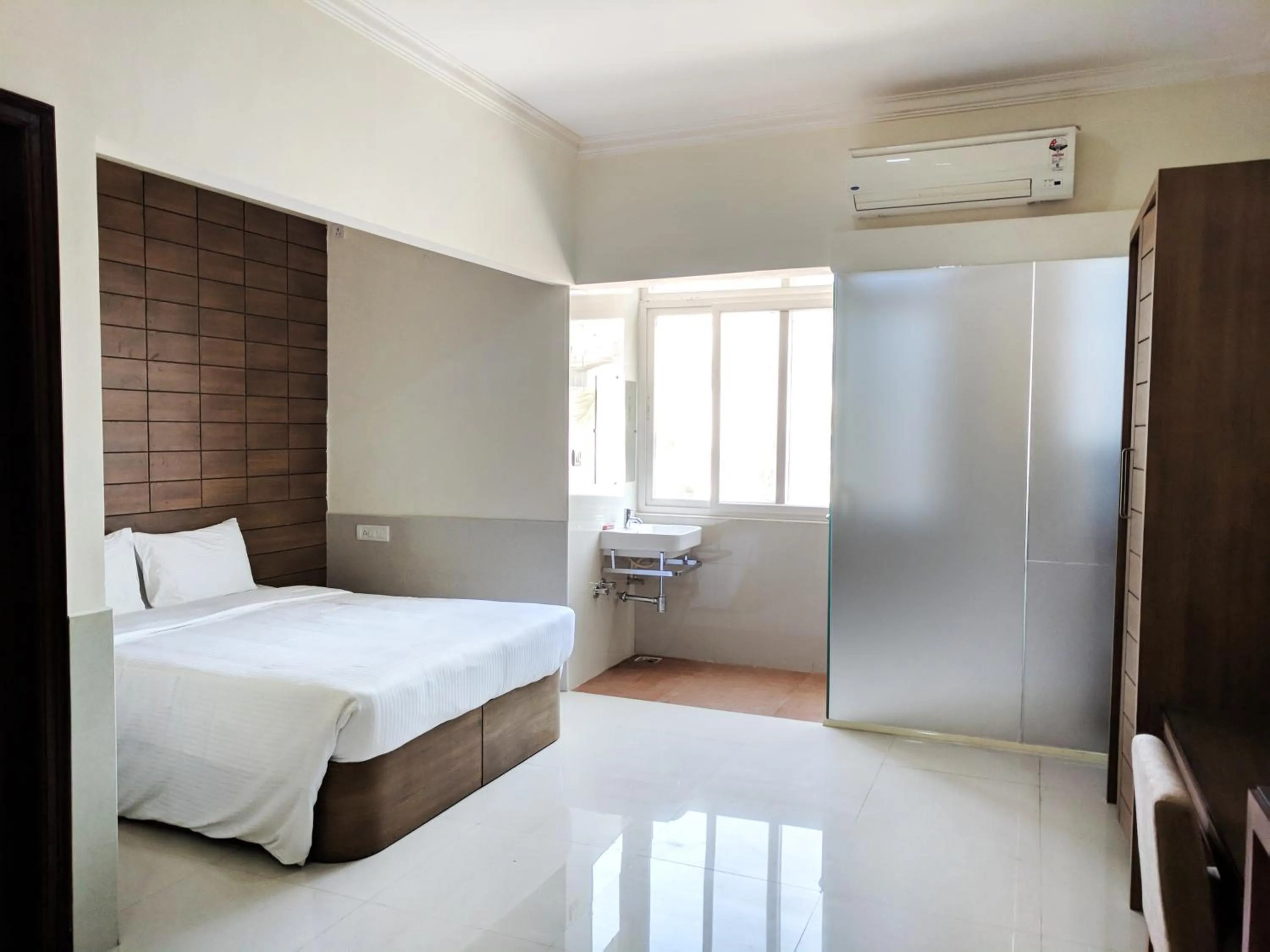 Bed in Clyford Suites